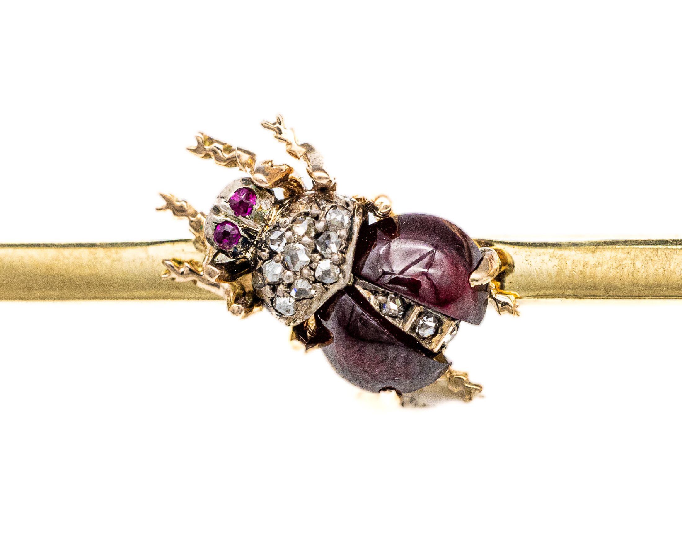 Detail a: 14 kt Gold Brosche "Käfer", GG 585/000, Körper aus Granat-Cabochon, kl. Diamantbesatz,L. ca. 6 cm, ca. 5.5 g