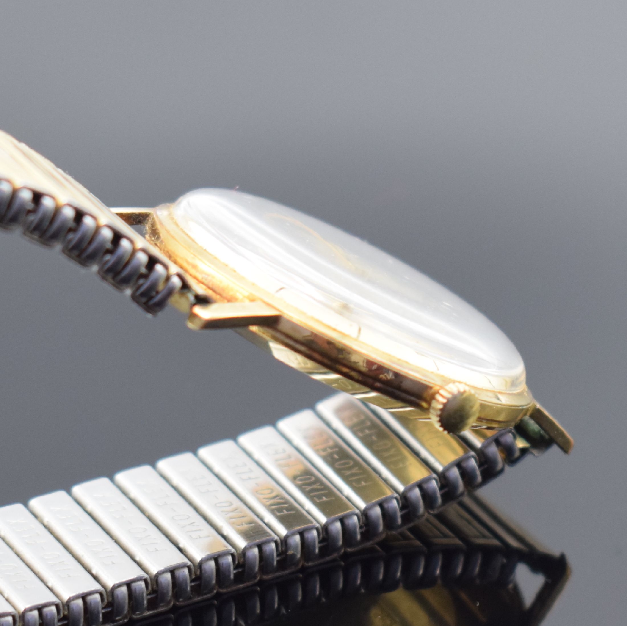 Detail b: PRIMATO Armbanduhr in GG 585/000, Automatik, Deutschland um 1965, Boden aufgedr., verg. Fixo-Flex-Band, Zentralsek., Datum, 25 St., Zentralrotor, ...