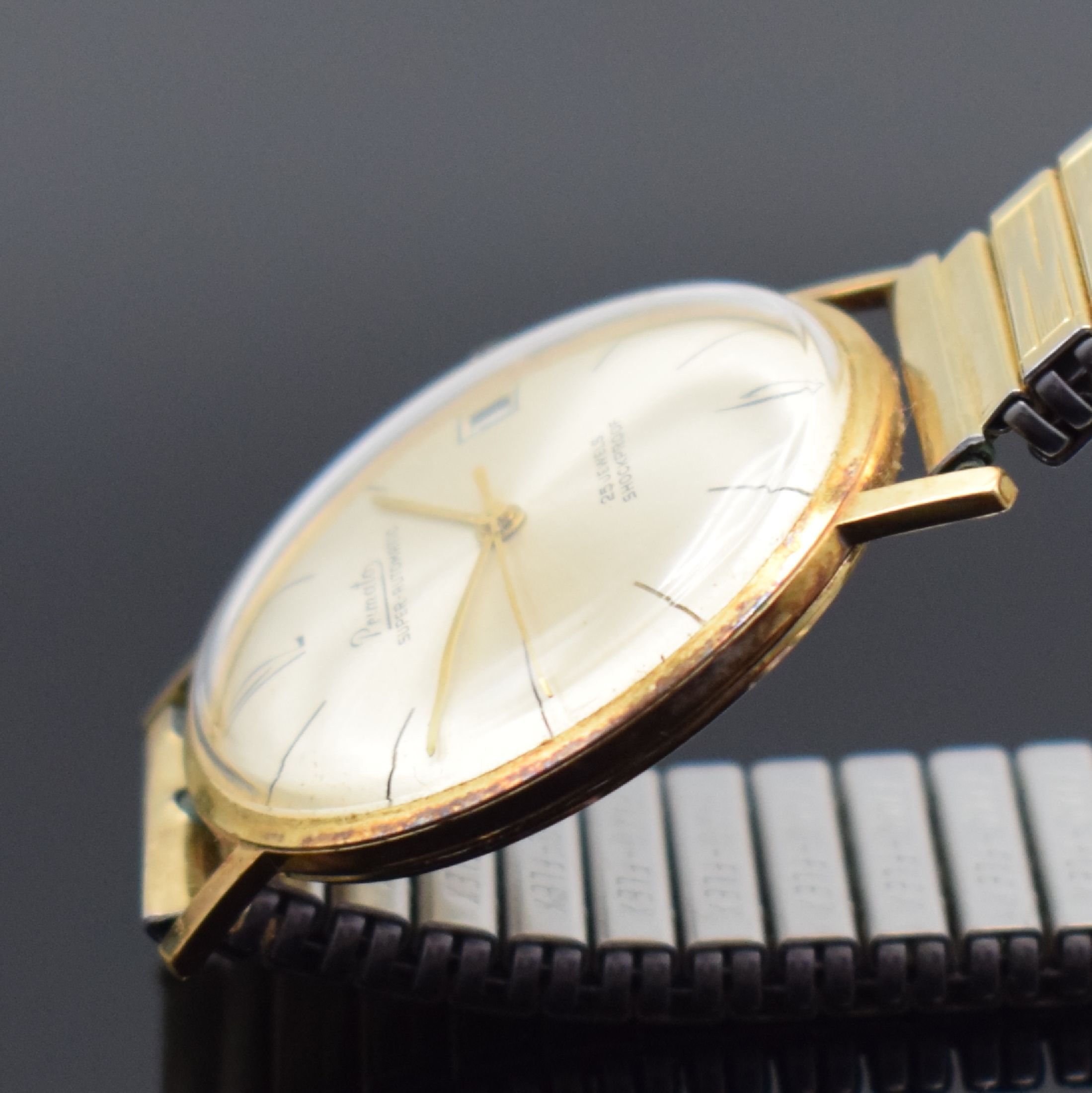 Detail c: PRIMATO Armbanduhr in GG 585/000, Automatik, Deutschland um 1965, Boden aufgedr., verg. Fixo-Flex-Band, Zentralsek., Datum, 25 St., Zentralrotor, ...