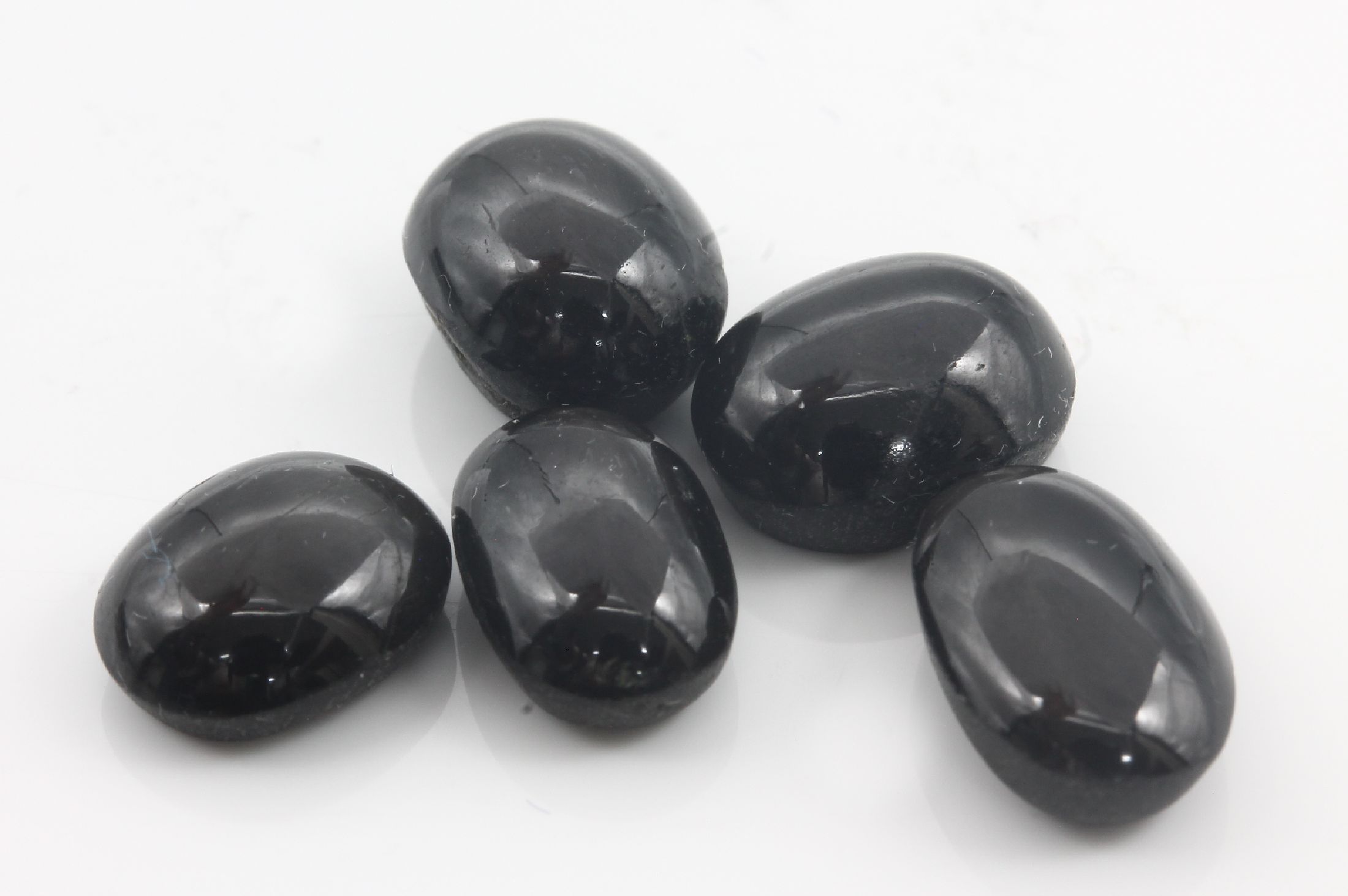 Detail a: Lot 5 lose Sternsaphir-Cabochons, zus. 22.16 ct oval, in versch. Größen
