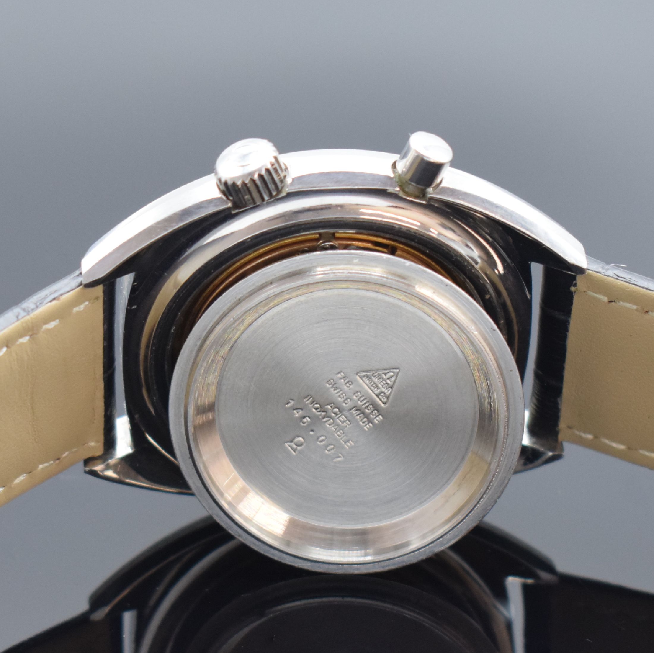 Detail e: OMEGA Seamaster Chronostop große Herrenarmbanduhr 41 mm Referenz 145.007, Schweiz um 1969, Handaufzug, Boden geschr., schwarzes Zifferbl. m. aufges. ...