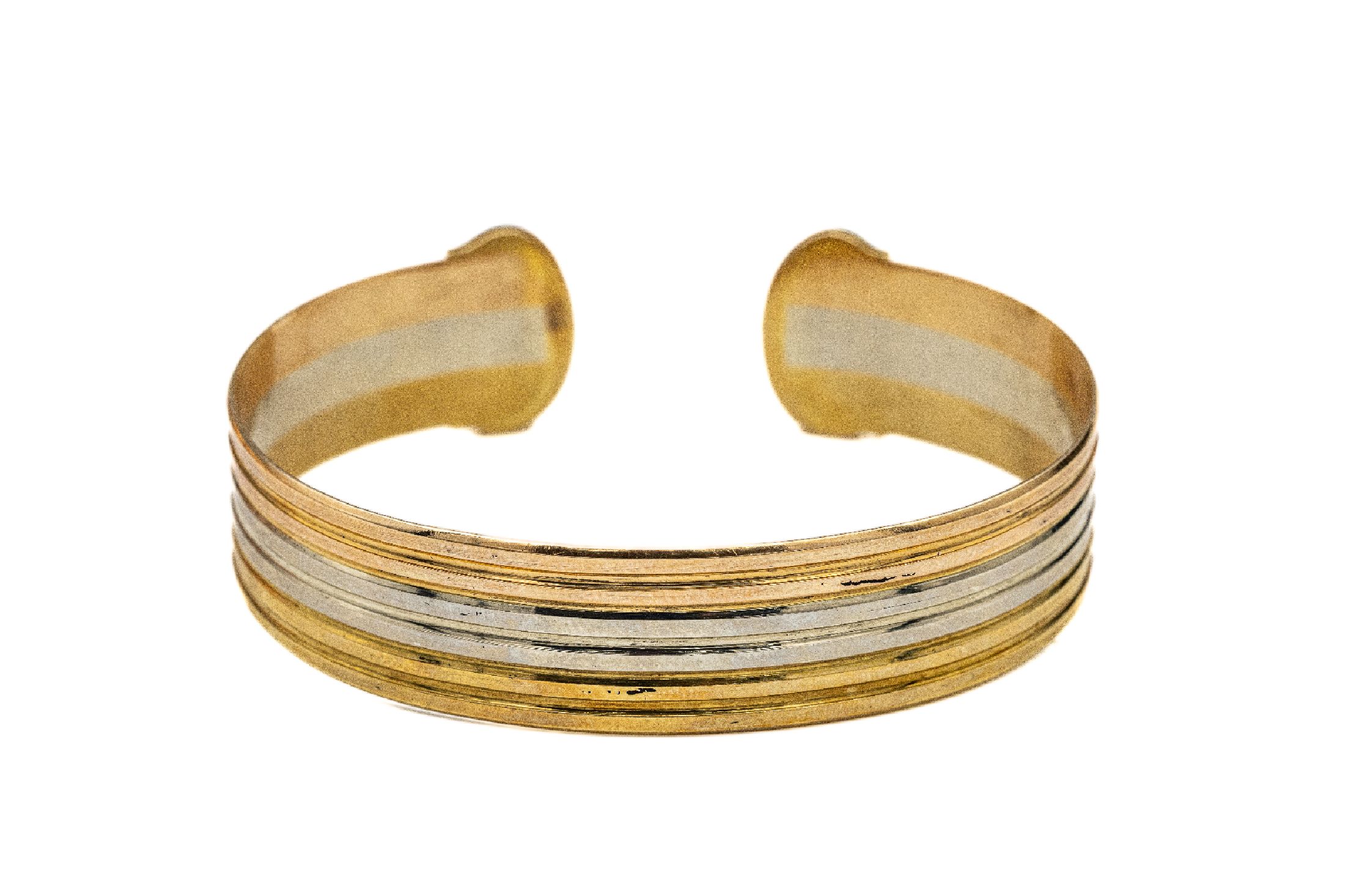 Detail a: 18 kt Gold CARTIER Armspange, GG/WG/RG 750/000, typ. CC Zeichen, sign. und num., 6.8 x 5.5 cm, Öffnung 2 cm, ca. 33.1 g