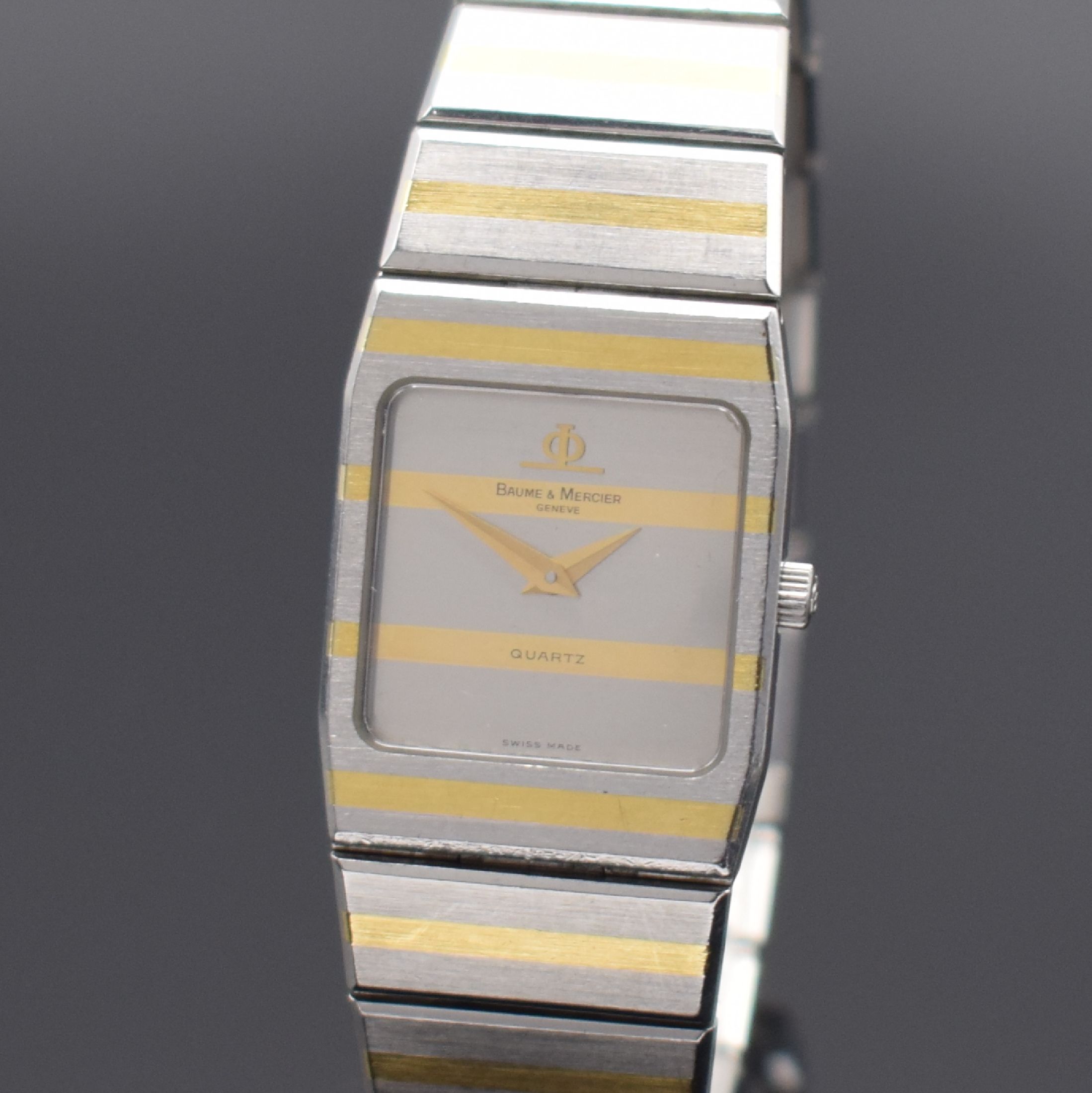 Detail a: BAUME & MERCIER Damenarmbanduhr, Schweiz um 1995, quarz, Edelstahl/Gold komb., Boden 4- fach verschr., orig. Gliederband, silb. Zifferbl. m. gold. ...