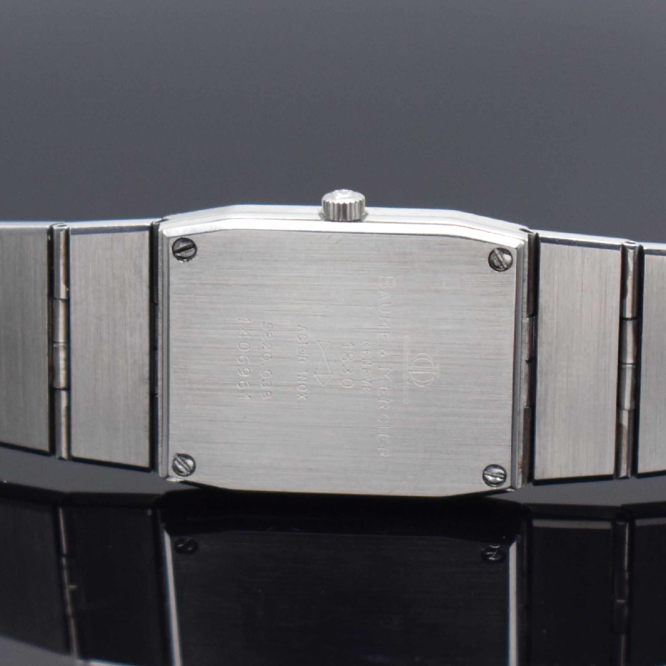 Detail d: BAUME & MERCIER Damenarmbanduhr, Schweiz um 1995, quarz, Edelstahl/Gold komb., Boden 4- fach verschr., orig. Gliederband, silb. Zifferbl. m. gold. ...
