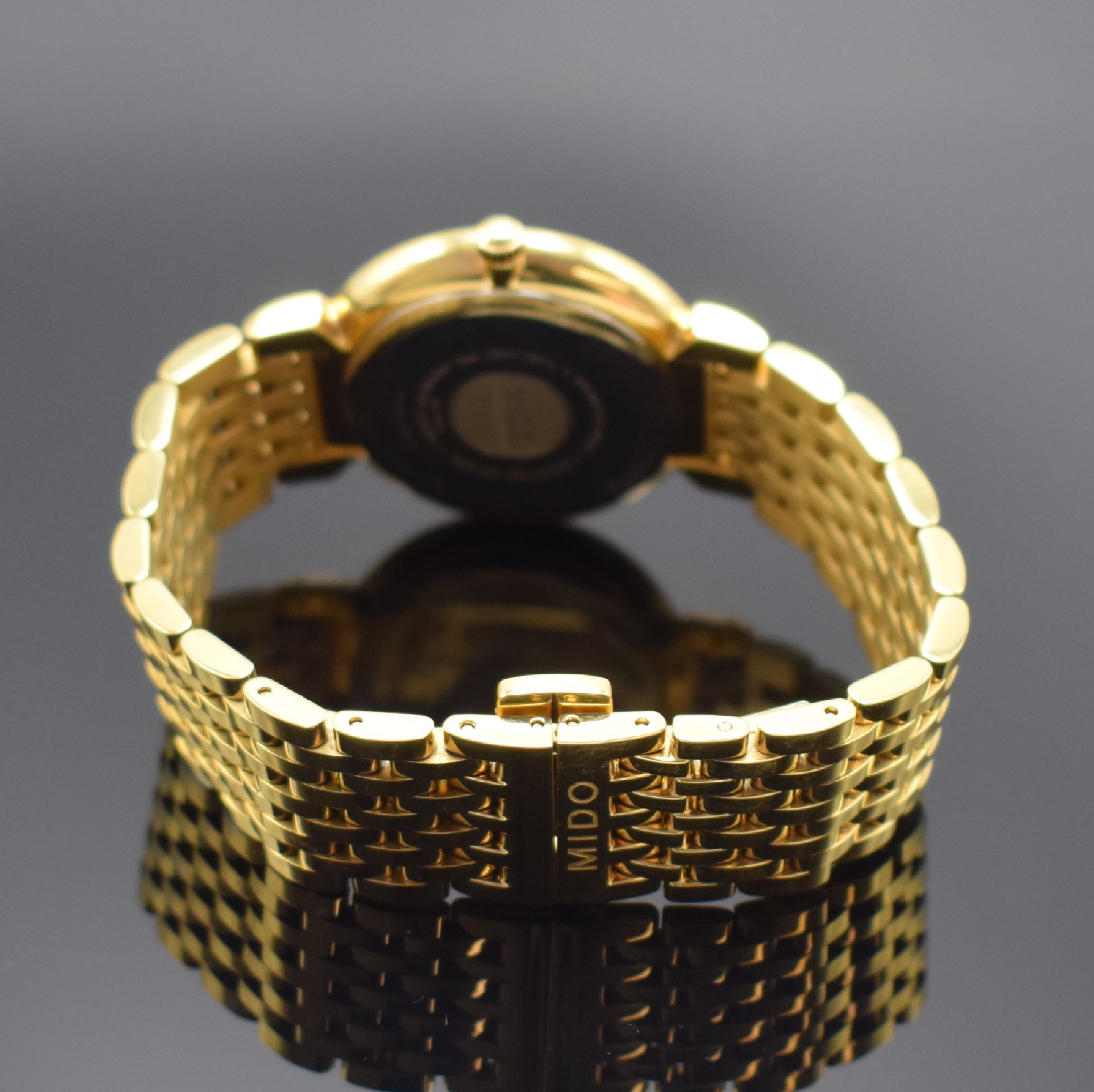 Detail b: MIDO Dorada Damenarmbanduhr Referenz M1130A, Schweiz um 2017, quarz, verg. Geh., Edelstahlboden aufgedr., verg. Gliederband m. dopp. Faltschl., gold. ...