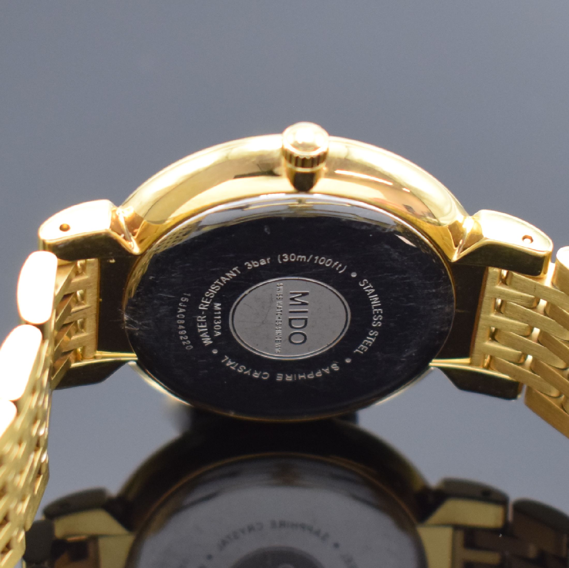 Detail d: MIDO Dorada Damenarmbanduhr Referenz M1130A, Schweiz um 2017, quarz, verg. Geh., Edelstahlboden aufgedr., verg. Gliederband m. dopp. Faltschl., gold. ...
