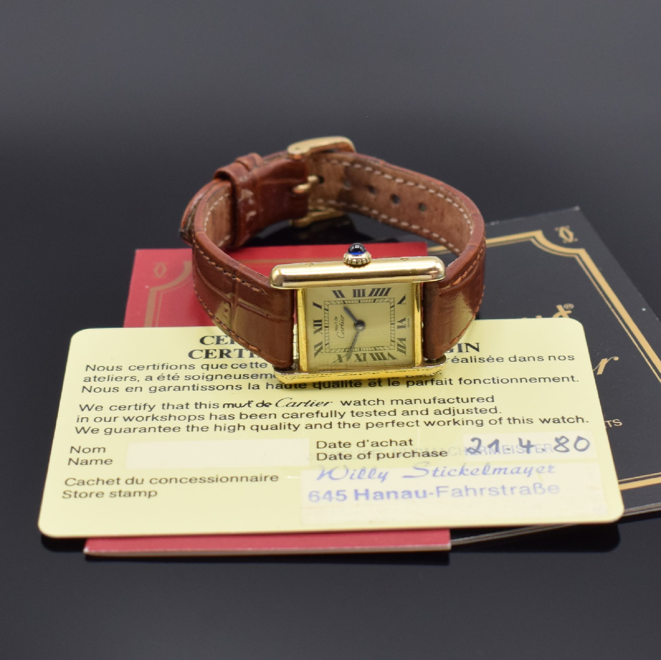 Detail d: CARTIER Tank Damenarmbanduhr, Schweiz um 1980, quarz, verg. Silbergehäuse seitlich 4-fach verschr., Schmuckkrone, champagnerfarb. Zifferbl. m. röm. ...