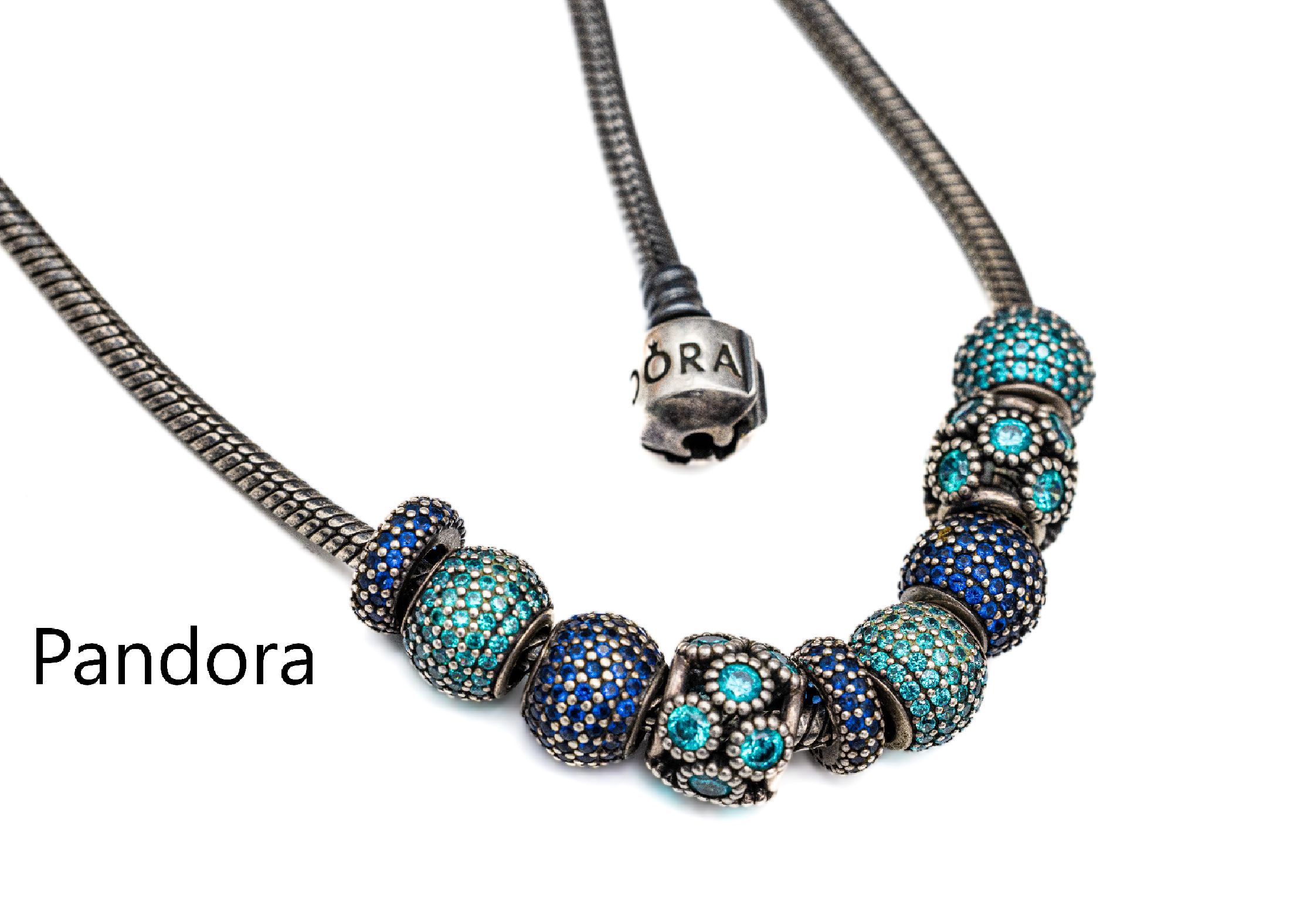 PANDORA Collier, 925er Silber, 9 Charms mit facett. grünen und blauen Kristallen, L. ca. 45 cm