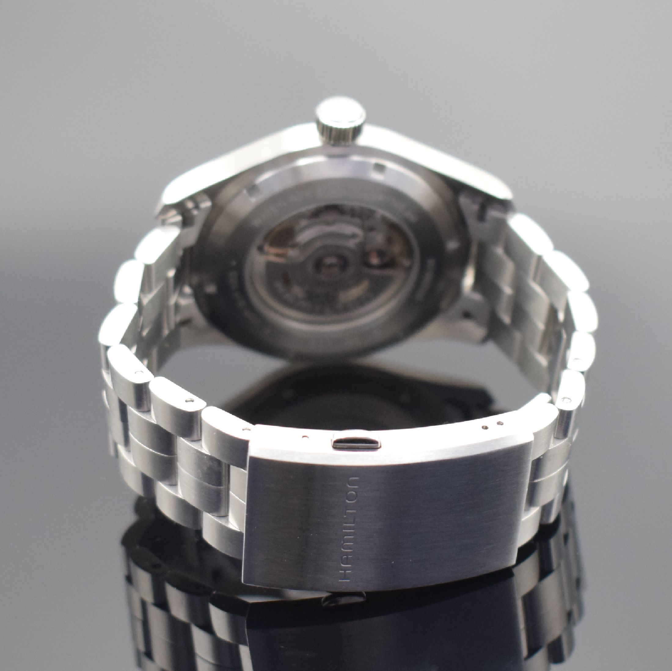 Detail b: HAMILTON Khaki neuwertige Herrenarmbanduhr in Stahl Referenz H70515137, Schweiz verk. lt. beil. Pap. 12/2022, Automatik, beids. vergl. Geh., Boden ...