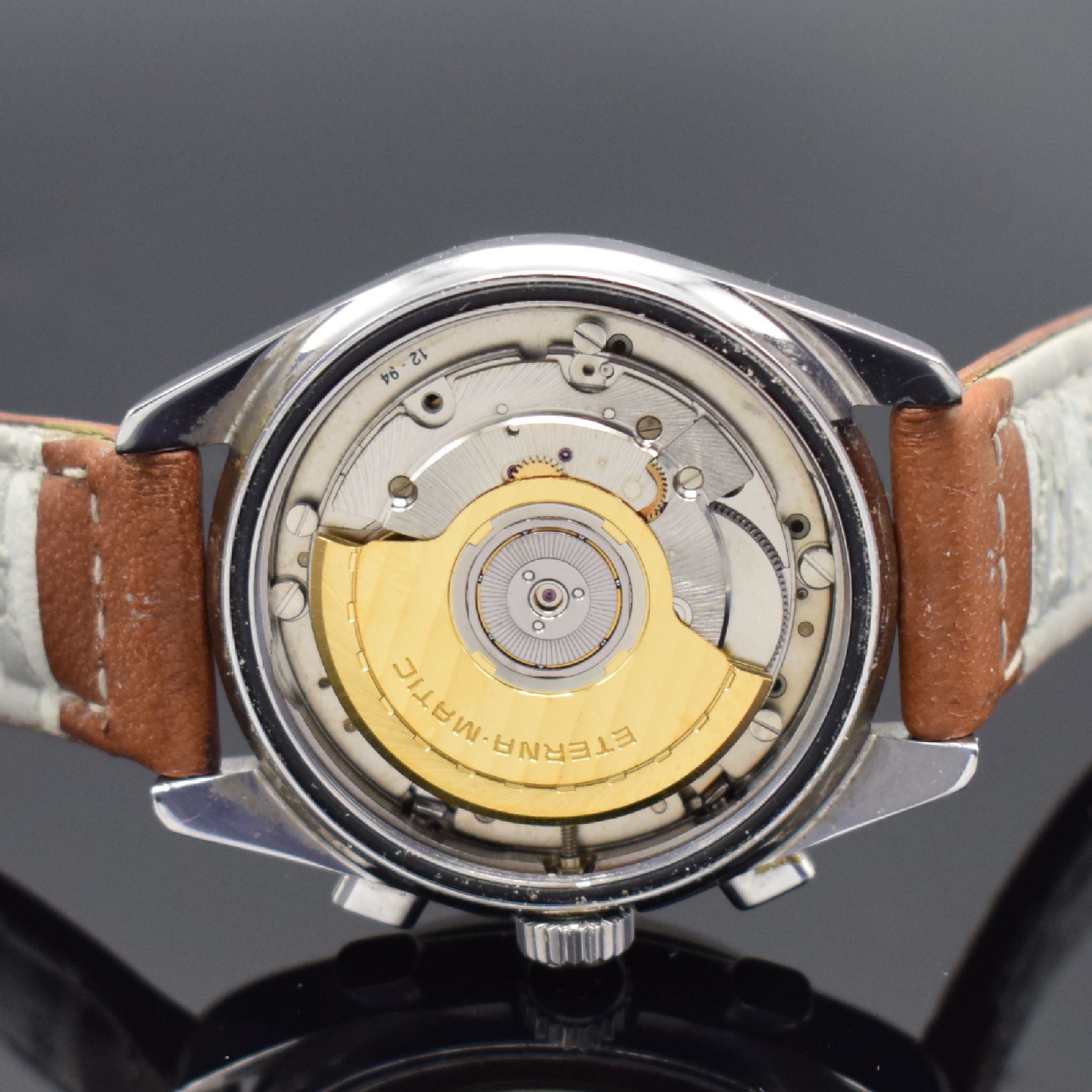 Detail e: ETERNA Kontiki Herrenchronograph in Stahl Referenz 685 1575.41, Schweiz lt. orig. Pap. verk. 2009, Automatik, Stahlgeh., neutr. Lederband, Boden und ...