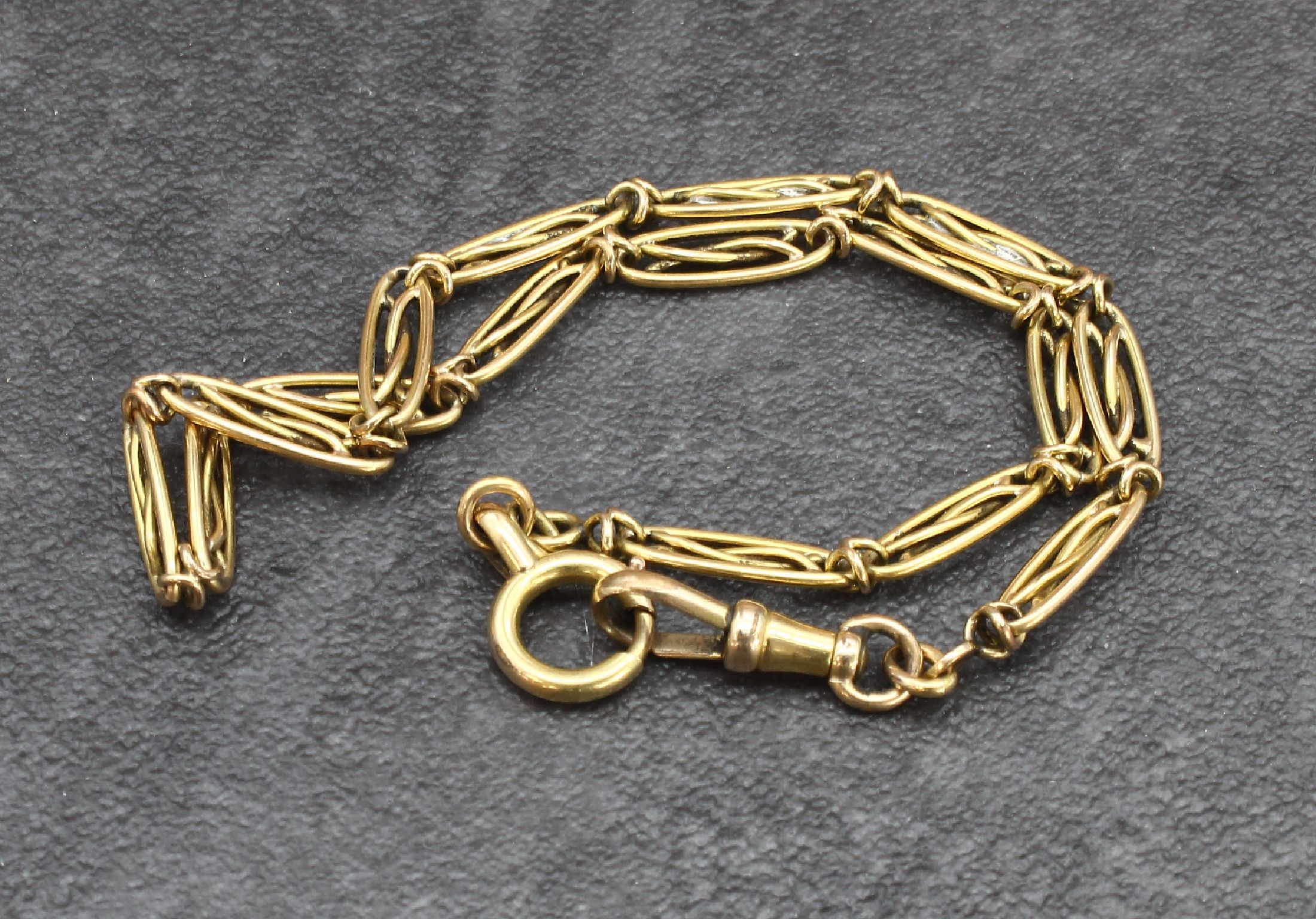 Detail c: 14 kt Gold Uhrenkette, um 1920, GG 585/000,total ca. 13.5 g, L. ca. 37 cm