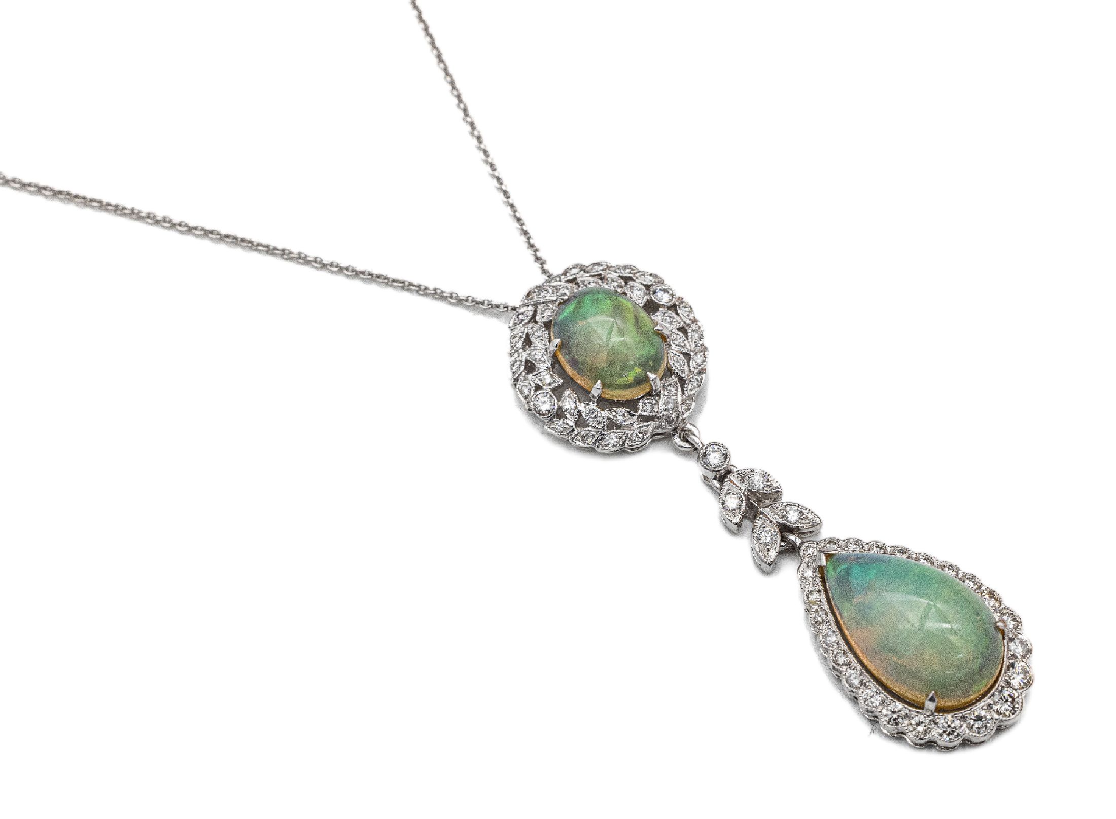 18 kt Gold Opal-Brillant-Anhänger an Kette, WG 750/000, leicht florale Gestaltung, 2 Opalcabochons zus. ca. 5.0 ct, schönes Farbspiel in Gelb, ...