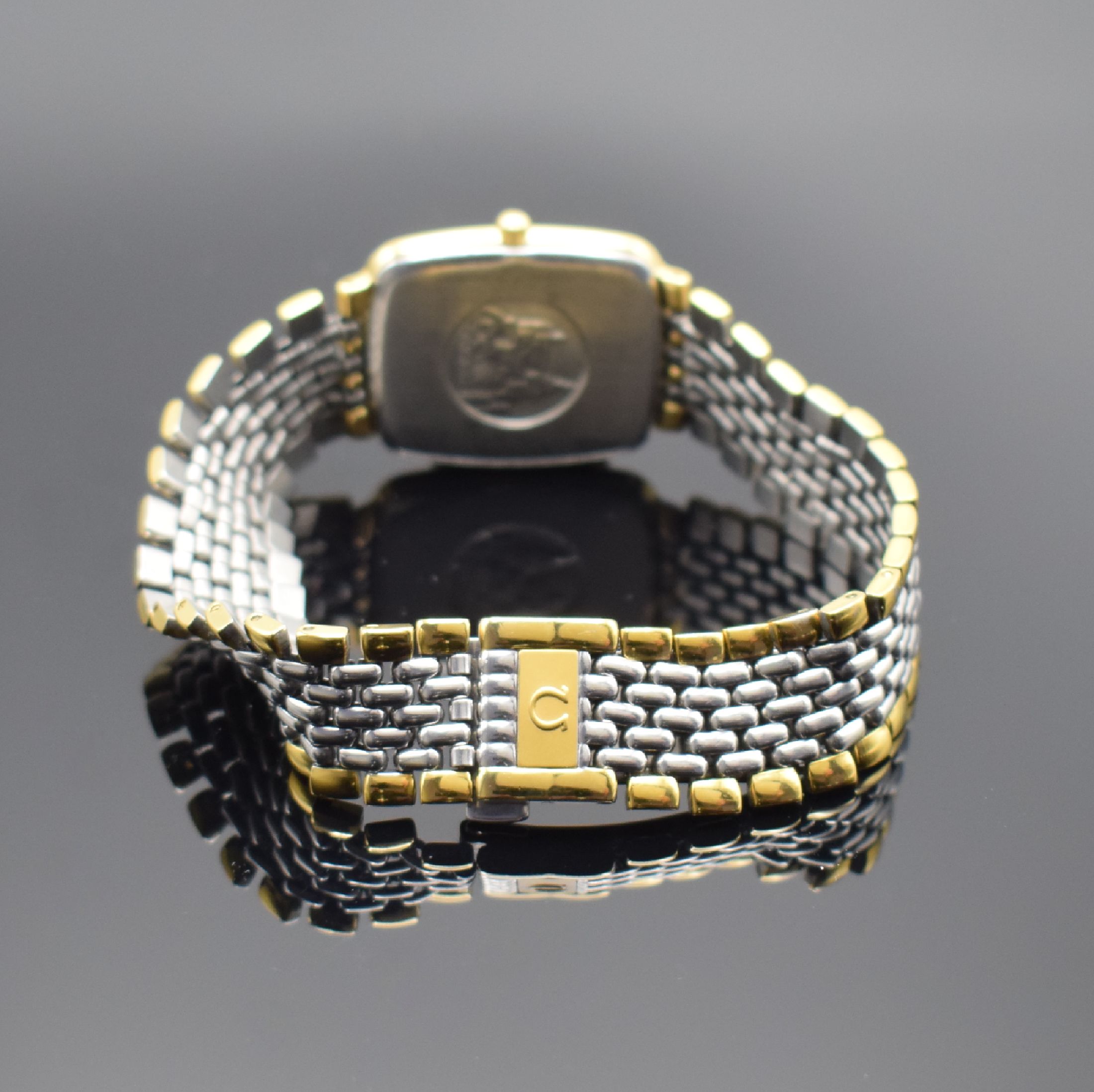 Detail b: OMEGA Armbanduhr Referenz 395 0876, Schweiz um 1990, quarz, Edelstahlgeh. teils verg., Boden gedr., Gliederband m. Faltschl., weißes Zifferbl. m. ...