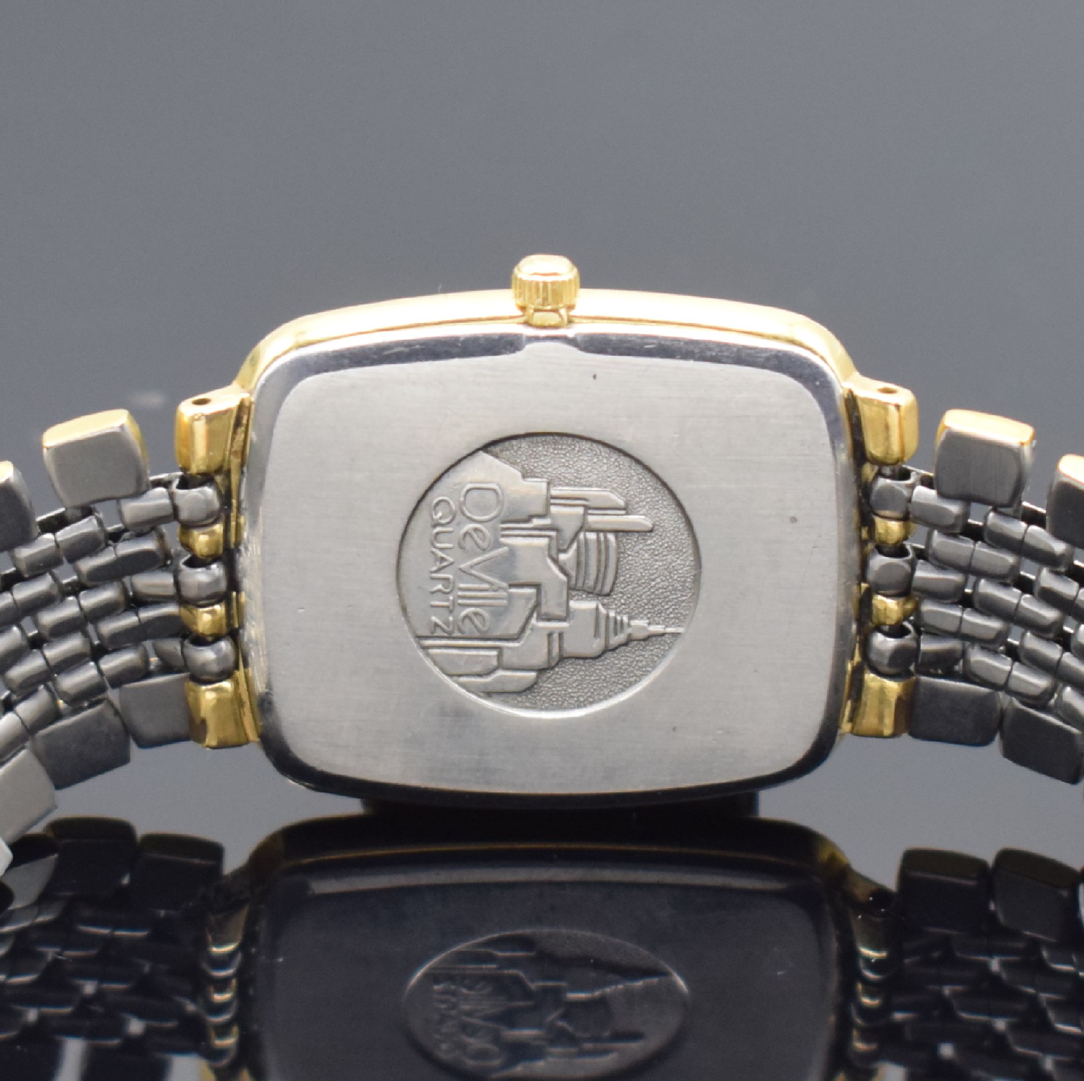 Detail d: OMEGA Armbanduhr Referenz 395 0876, Schweiz um 1990, quarz, Edelstahlgeh. teils verg., Boden gedr., Gliederband m. Faltschl., weißes Zifferbl. m. ...