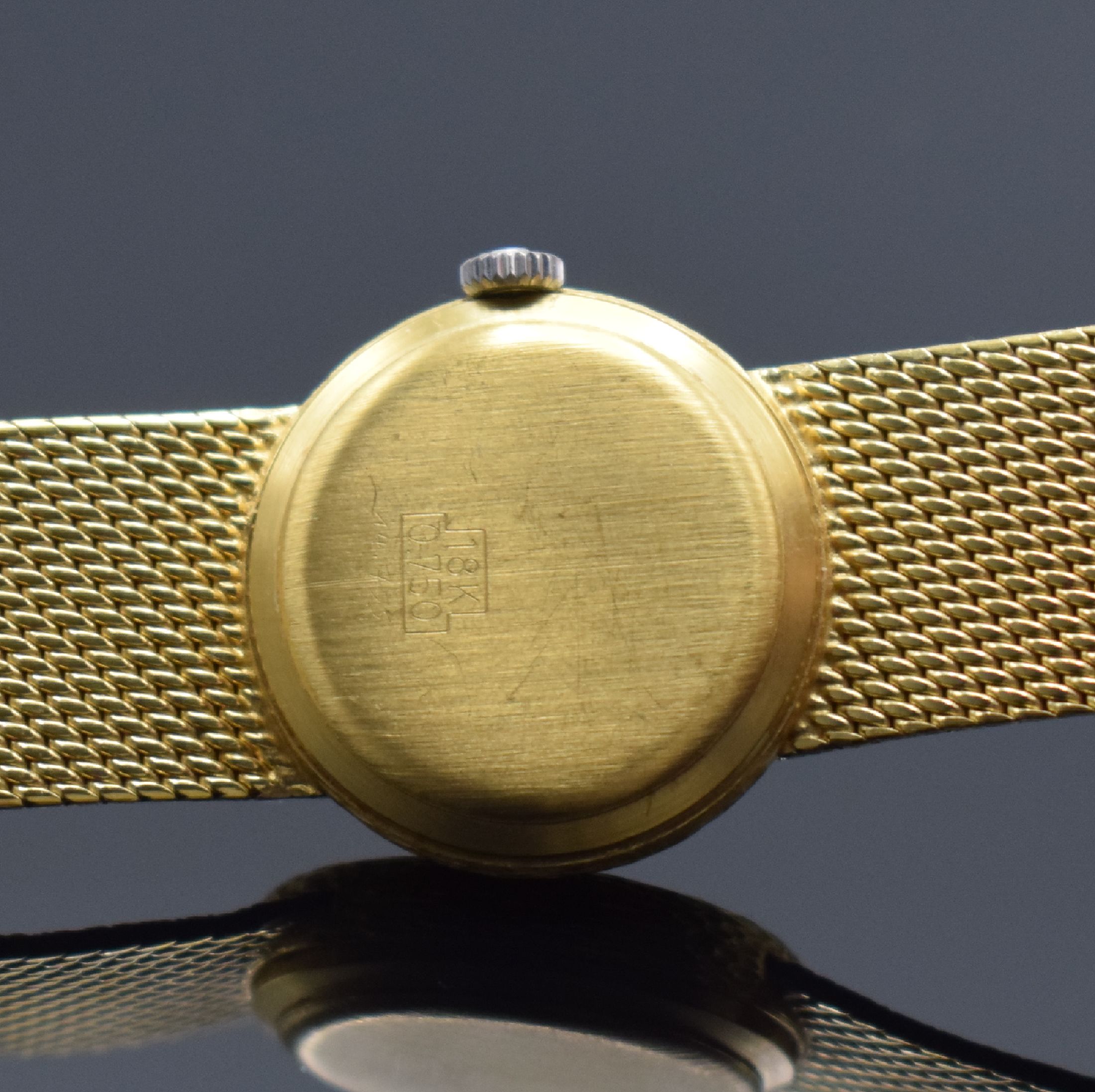 Detail d: MILUS Damenarmbanduhr in GG 750/000, Schweiz um 1965, Handaufzug, GG 750/000 Band, Boden aufgedr., Lapislazuli-Zifferbl. riss., gold. Zeiger, sign. ...