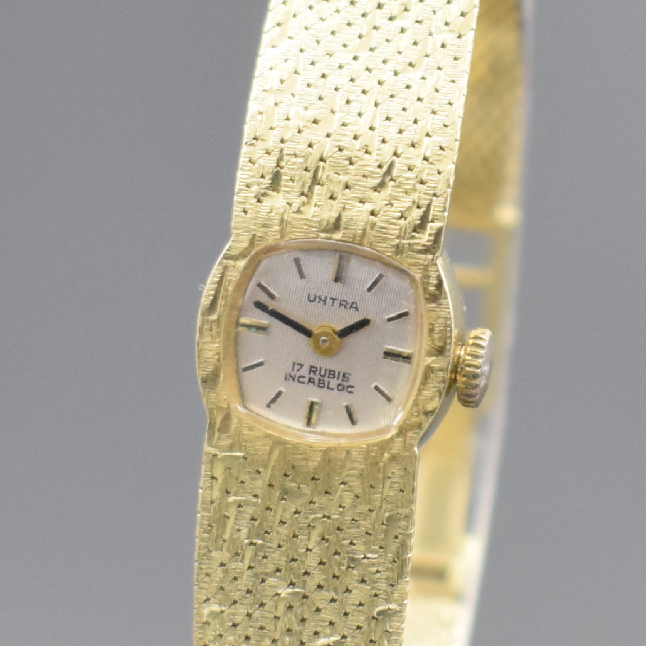 Detail a: UHTRA Damenarmbanduhr in GG 585/000, Deutschland um 1965, Handaufzug, 2-teil. Geh., Boden aufgedr., Milanaise-Band in GG 585/000, silb. Zifferbl. m. ...