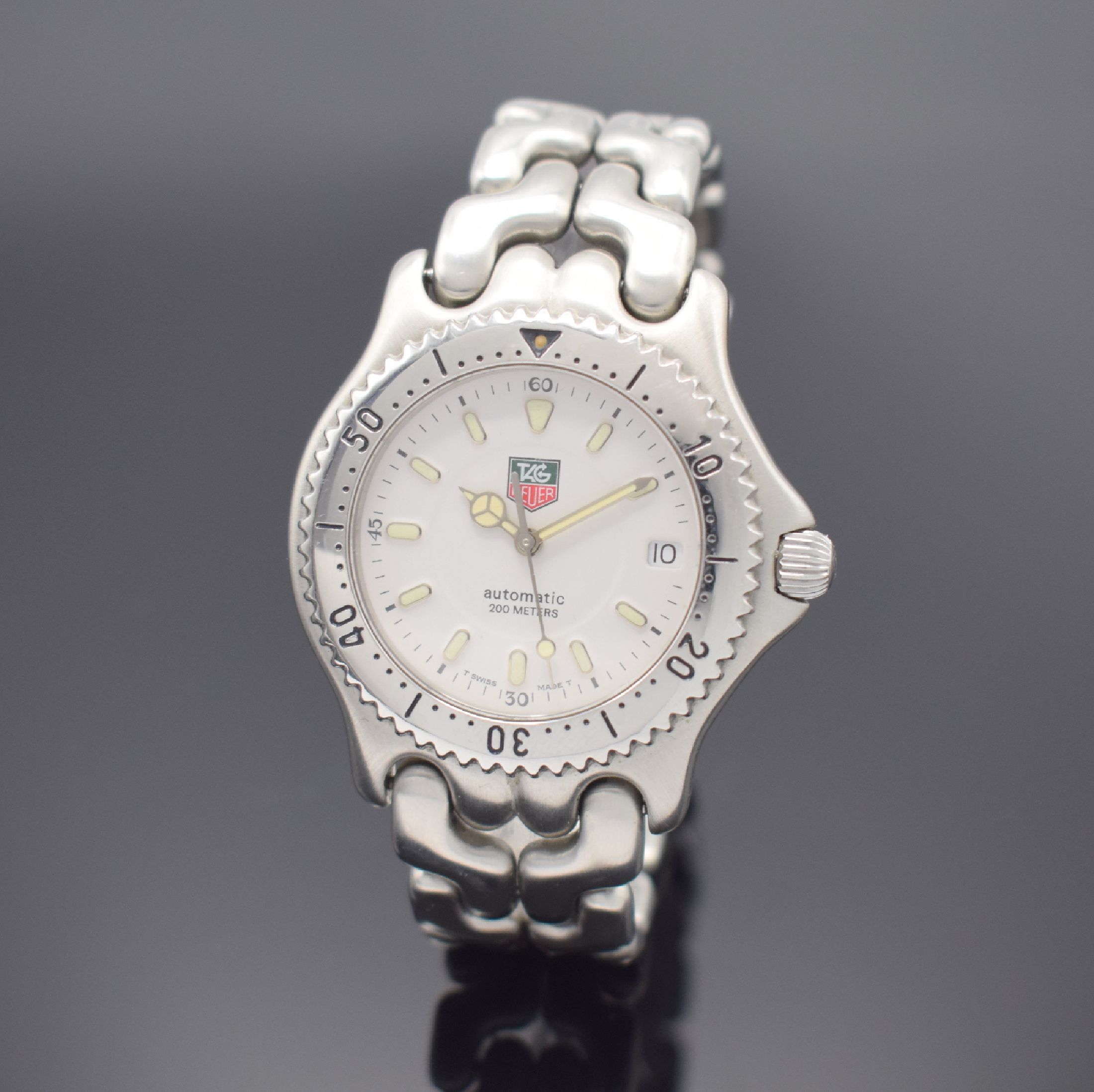 TAG HEUER Herrenarmbanduhr Referenz S89.706, Schweiz um 1995, Automatik, Edelstahlgeh. inkl. Gliederband mit Faltschl., Boden und Krone verschr., ...