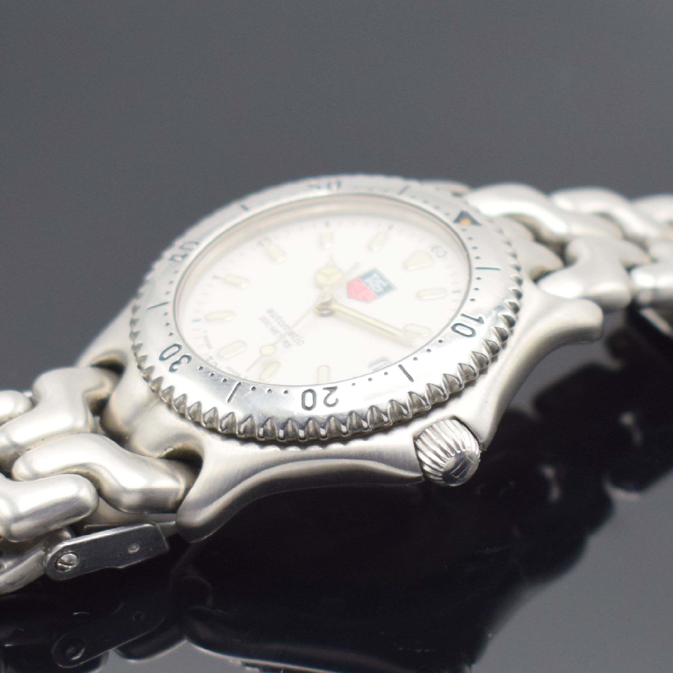Detail c: TAG HEUER Herrenarmbanduhr Referenz S89.706, Schweiz um 1995, Automatik, Edelstahlgeh. inkl. Gliederband mit Faltschl., Boden und Krone verschr., ...