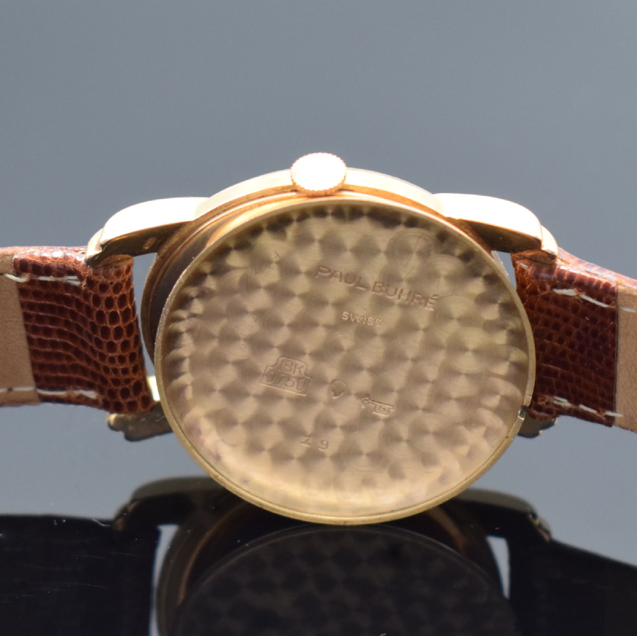 Detail f: PAUL BUHRE Herrenarmbanduhr in RG 750/000, Schweiz um 1945, Handaufzug, 2-tlg. Geh. m. ausgefallenen Anstößen, Boden aufgedr., silb. Zifferbl. fl., ...