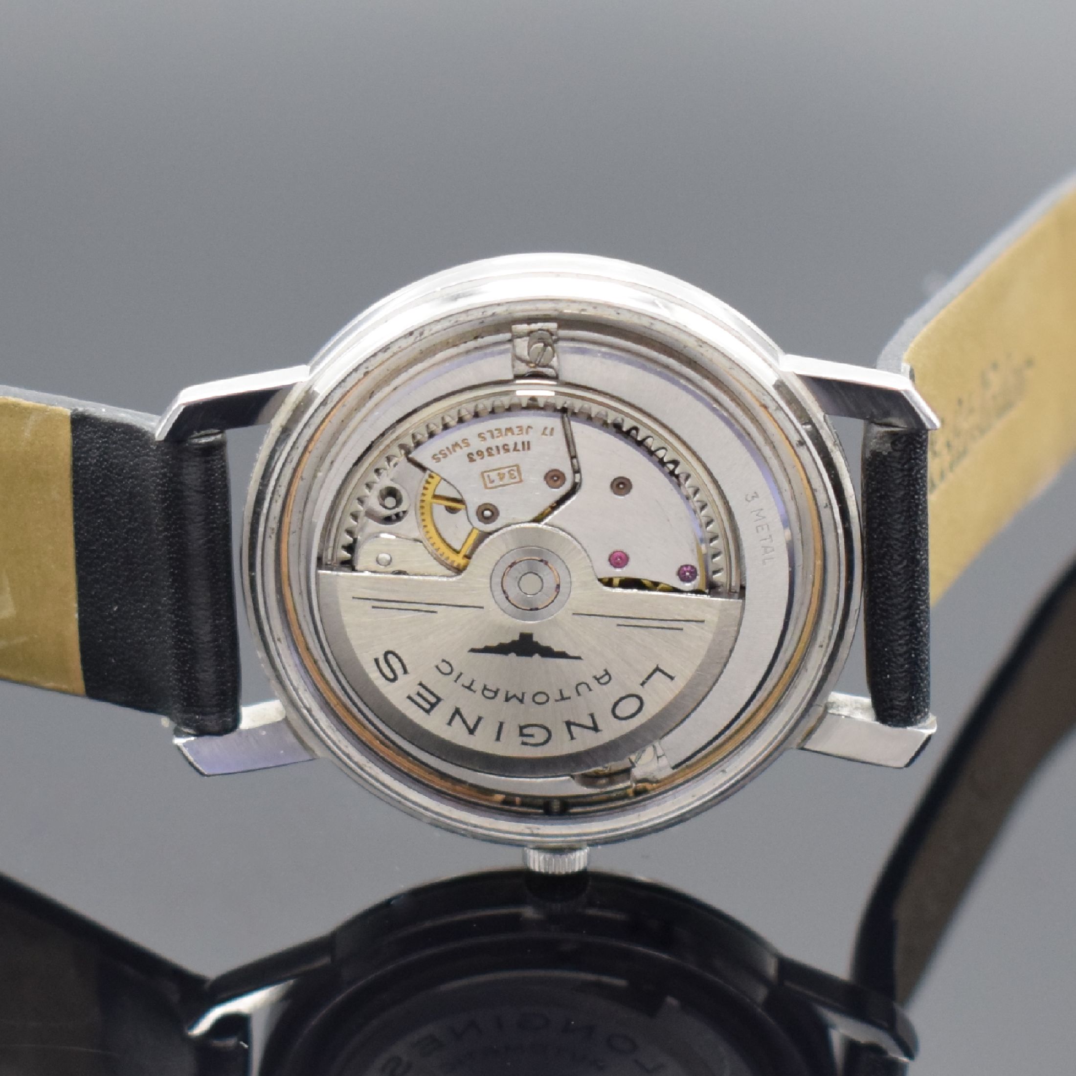 Detail e: LONGINES Flagship Herrenarmbanduhr in Stahl, Schweiz um 1962, Automatik, verschr. Geh., Boden m. Goldplakette, orig. Krone, silb. Zifferbl., aufges. ...