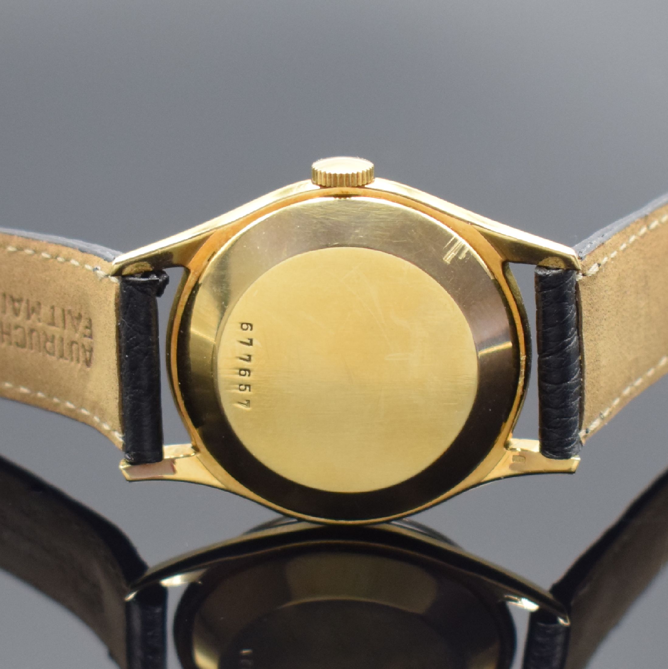 Detail c: ULYSSE NARDIN Herrenarmbanduhr in GG 750/000, Schweiz um 1960, Automatik, 3-tlg. Geh., Boden und Glasrand aufgedr., wunderbares schwarzes ...