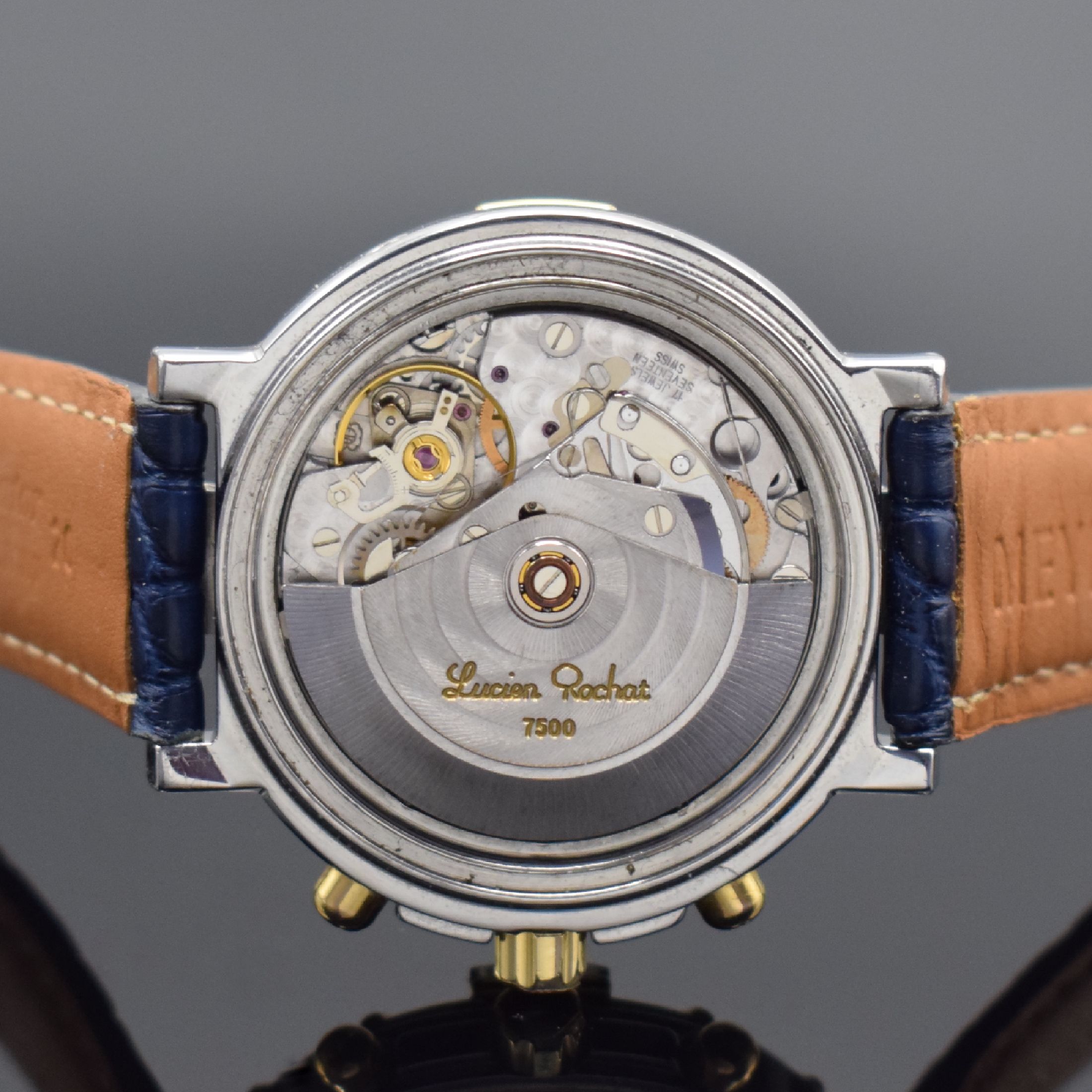 Detail e: LUCIEN ROCHAT Herrenchronograph mit Voll- Kalender in Stahl, Schweiz um 1990, Automatik, Geh. m. eins. drehb. Lunette, einges. Gold-Indexe, Boden u. ...