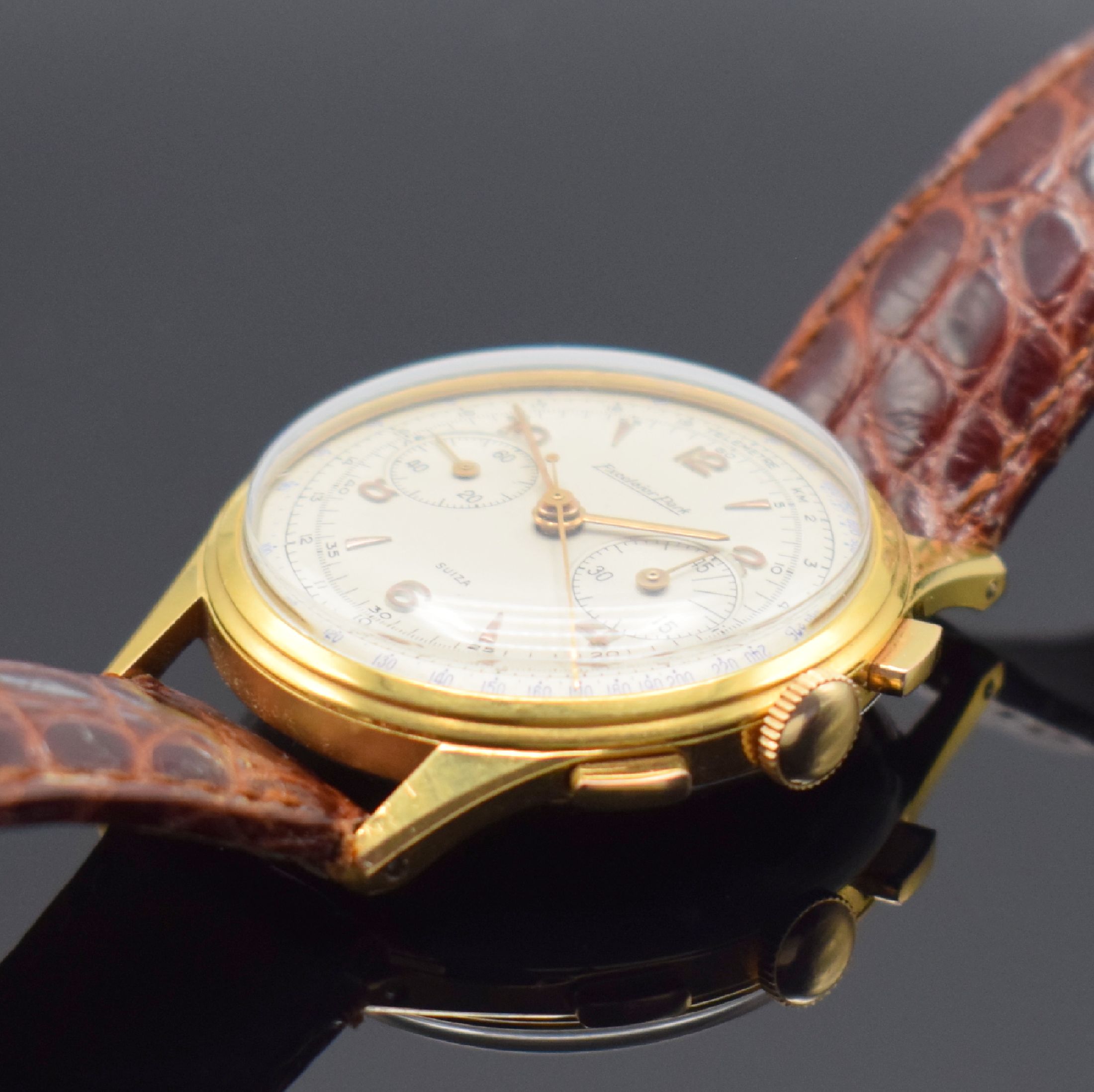 Detail b: EXCELSIOR PARK Kaliber 4 vergoldeter Schaltradchronograph, Schweiz um 1950, Handaufzug, 3-tlg. Geh. m. aufgedr. Stahlboden, silb. Zifferbl., rotgold. ...
