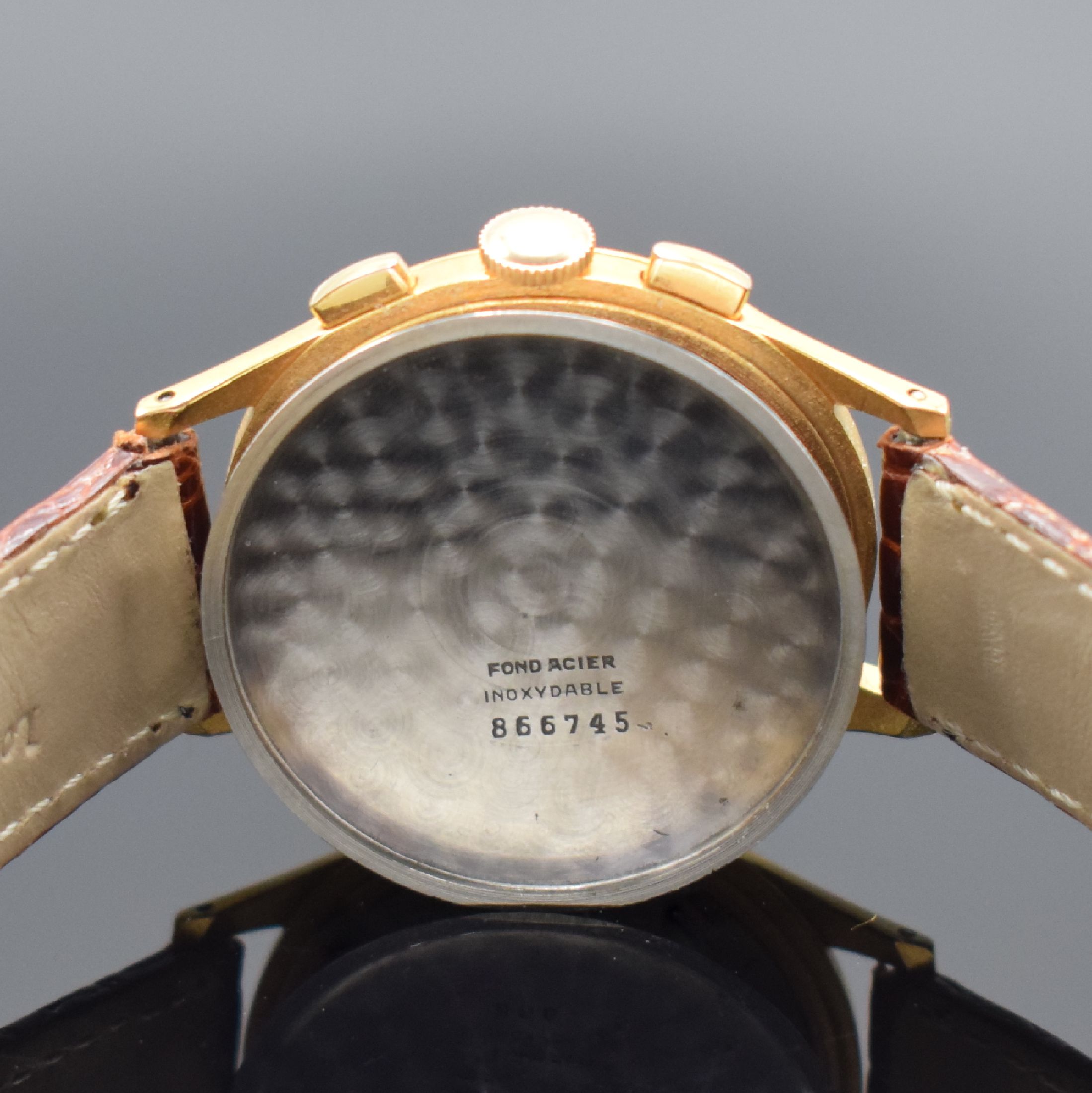 Detail e: EXCELSIOR PARK Kaliber 4 vergoldeter Schaltradchronograph, Schweiz um 1950, Handaufzug, 3-tlg. Geh. m. aufgedr. Stahlboden, silb. Zifferbl., rotgold. ...