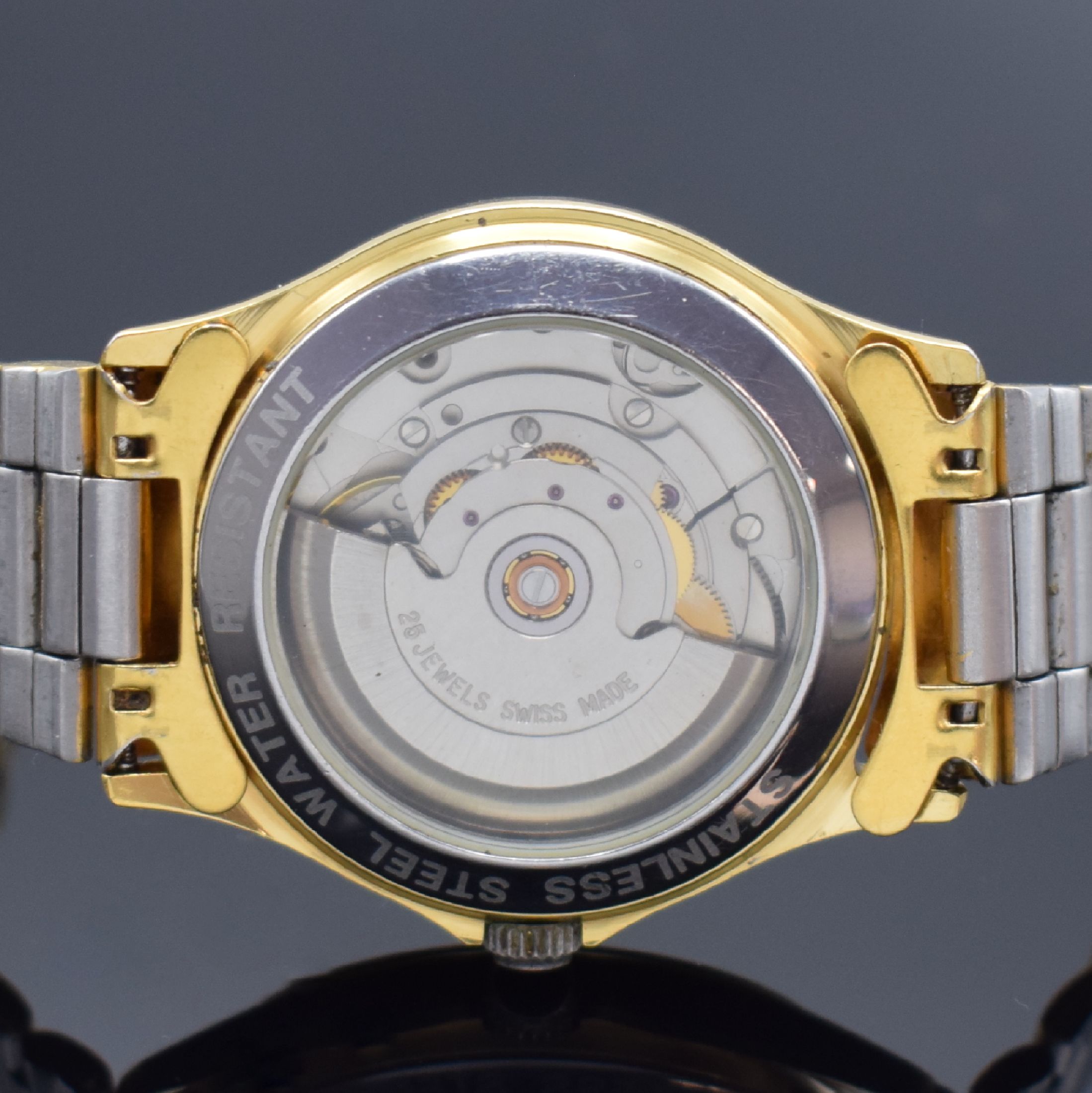 Detail d: GUB vergoldete Stahl Herrenarmbanduhr, Deutschland/Schweiz Anfang 1990er Jahre, Automatik, beids. vergl. Geh., Boden verschr., schwarze Lünette m. ...