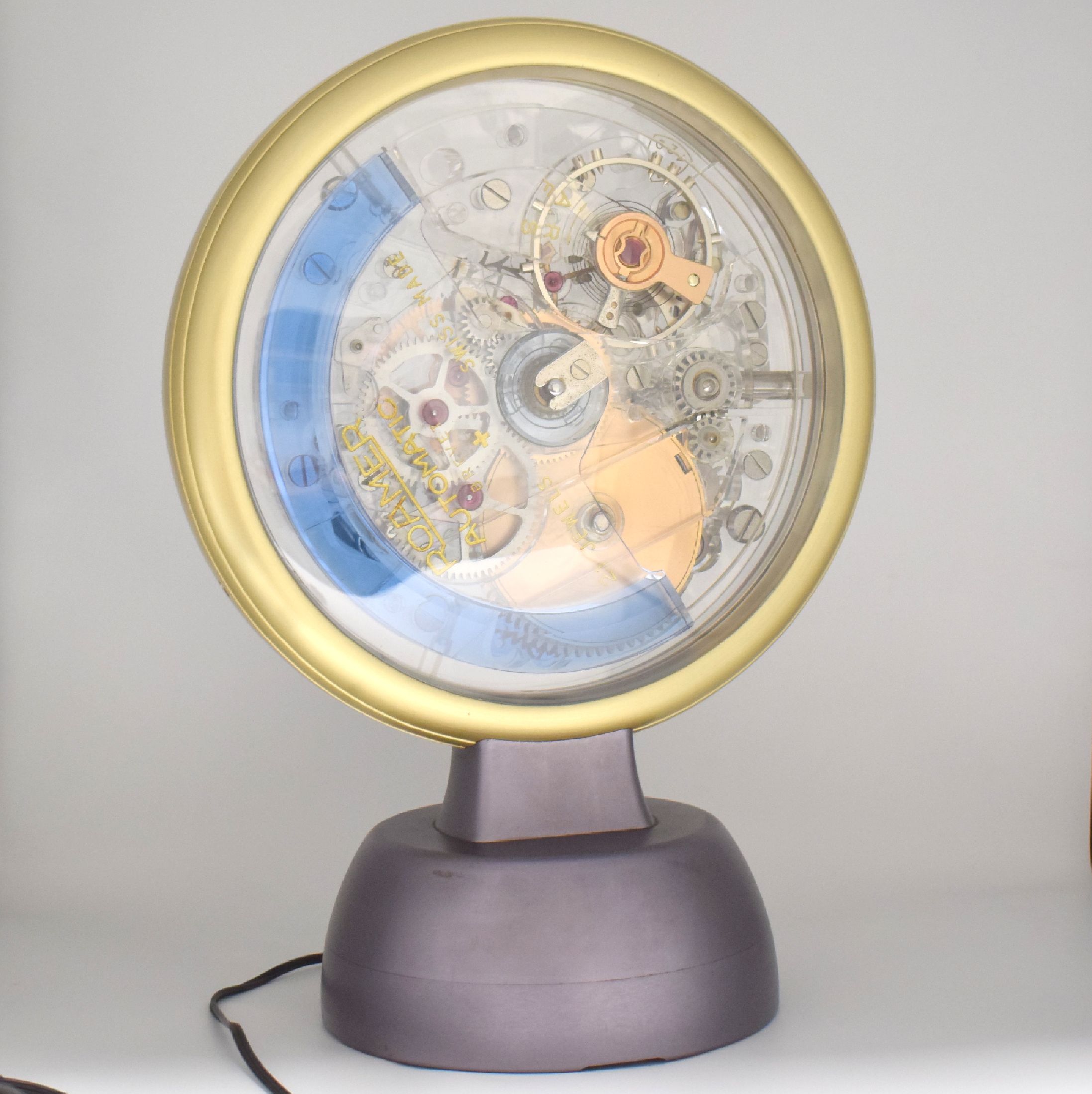 Detail a: ROAMER extrem seltenes Uhrwerkmodell Kaliber MST 420, Schweiz um 1965, Automatik, beids. vergl. Metallgeh. auf gerundetem Sockel, durchsichtiges rein ...