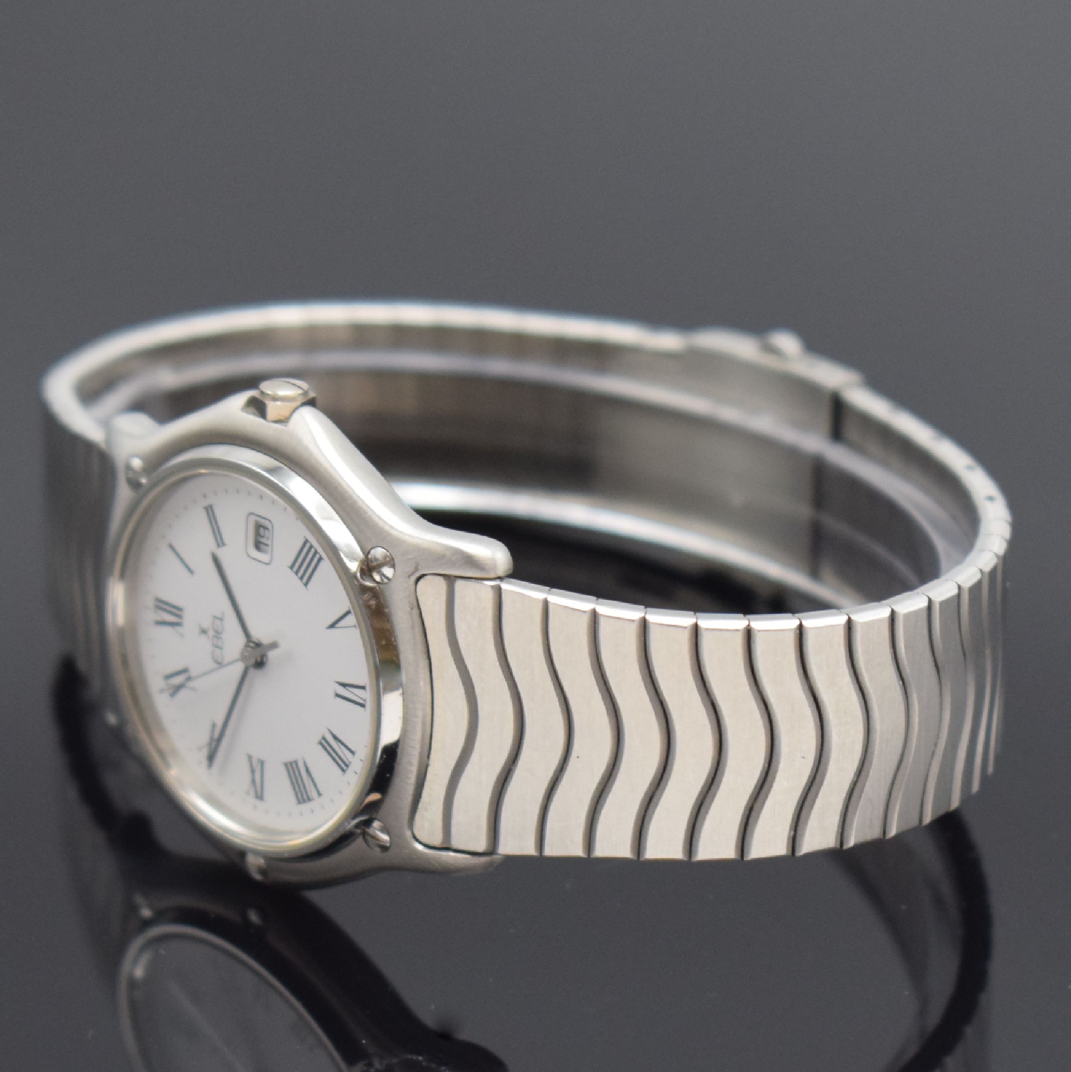 Detail b: EBEL Sport Classique Armbanduhr in Stahl Referenz 983909, Schweiz um 1990, quarz, Stülpgeh., Lünette 5-fach verschr., Wellengliederband, weißes ...