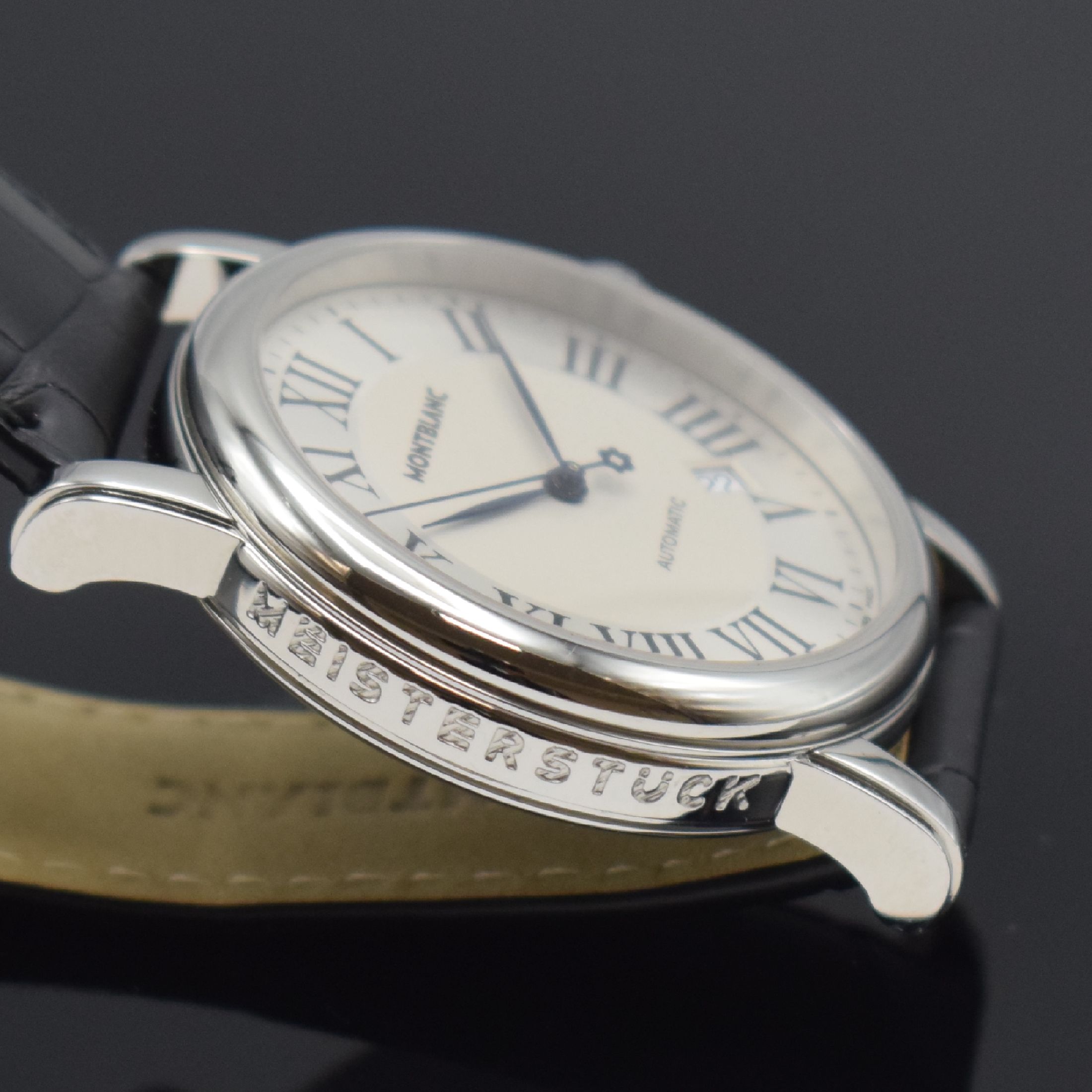 Detail d: MONTBLANC Star Herrenarmbanduhr Referenz 7068, Schweiz um 2005, Automatik, Edelstahlgeh., Boden aufgedr., orig. Lederband m. orig. Faltschl., silb. ...