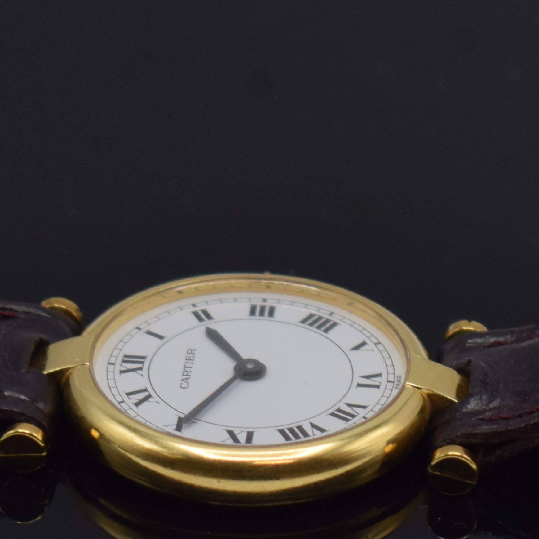 Detail d: CARTIER Vendome Damenarmbanduhr in GG 750/000, Schweiz um 1990, quarz, 2-teil. Geh., Boden 2-fach verschr., weißes Zifferbl. m. röm. Zahlen, ...