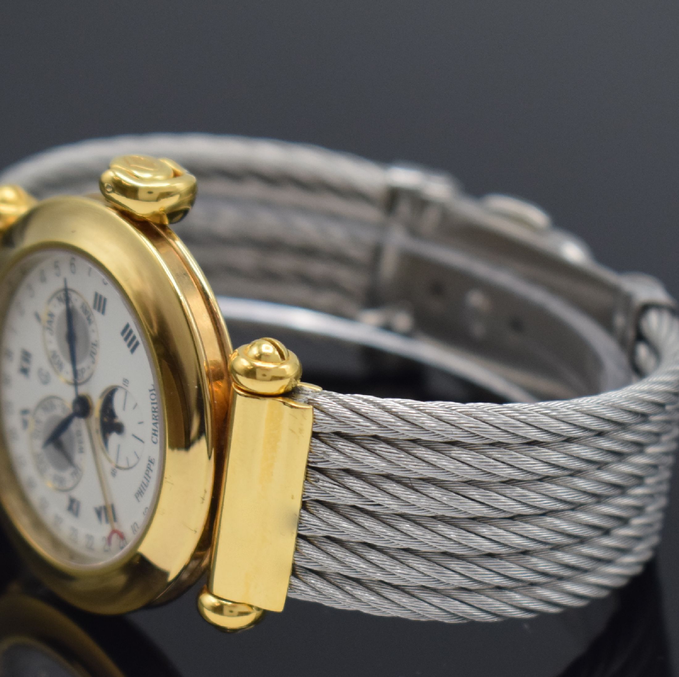 Detail b: PHILIPPE CHARRIOL Herrenarmbanduhr mit Vollkalender, Schweiz um 1995, quarz, verg. Geh., Boden aufgedr., Kordel-Stahlband, weißes Zifferbl. m. röm. ...