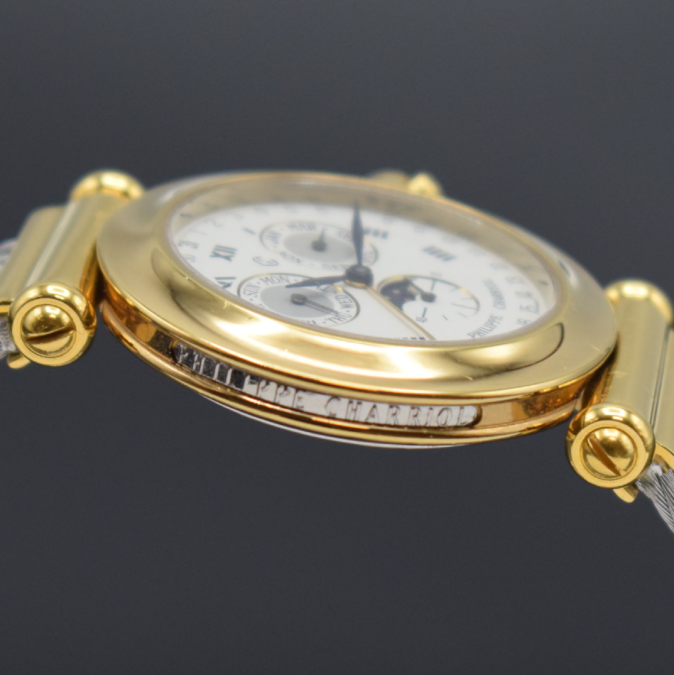 Detail e: PHILIPPE CHARRIOL Herrenarmbanduhr mit Vollkalender, Schweiz um 1995, quarz, verg. Geh., Boden aufgedr., Kordel-Stahlband, weißes Zifferbl. m. röm. ...