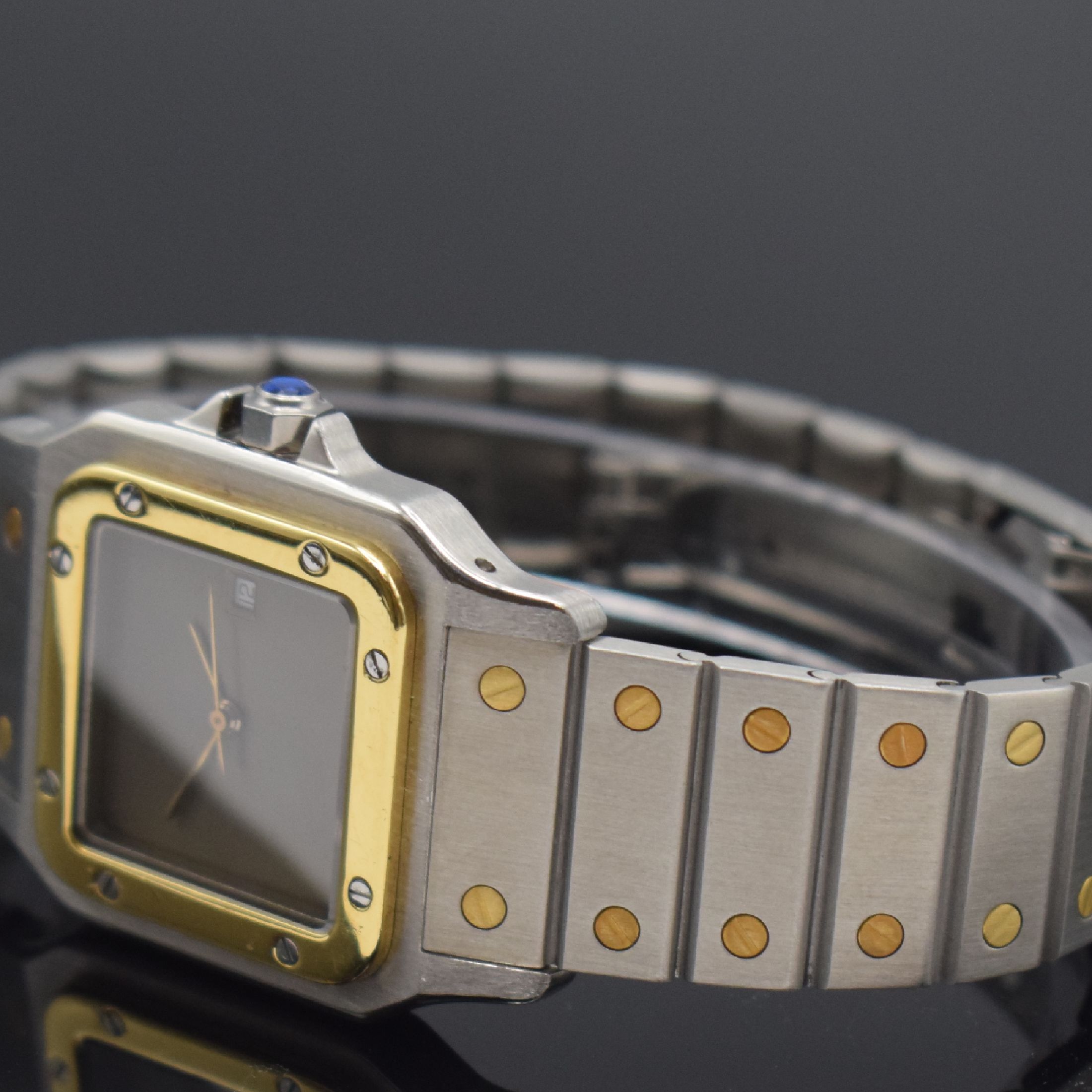 Detail b: CARTIER Santos Herrenarmbanduhr, Schweiz um 1985, Automatik, Edelstahl/Gold kombiniert inkl. Gliederband m. Faltschl., Monocoque- Geh., Lünette ...
