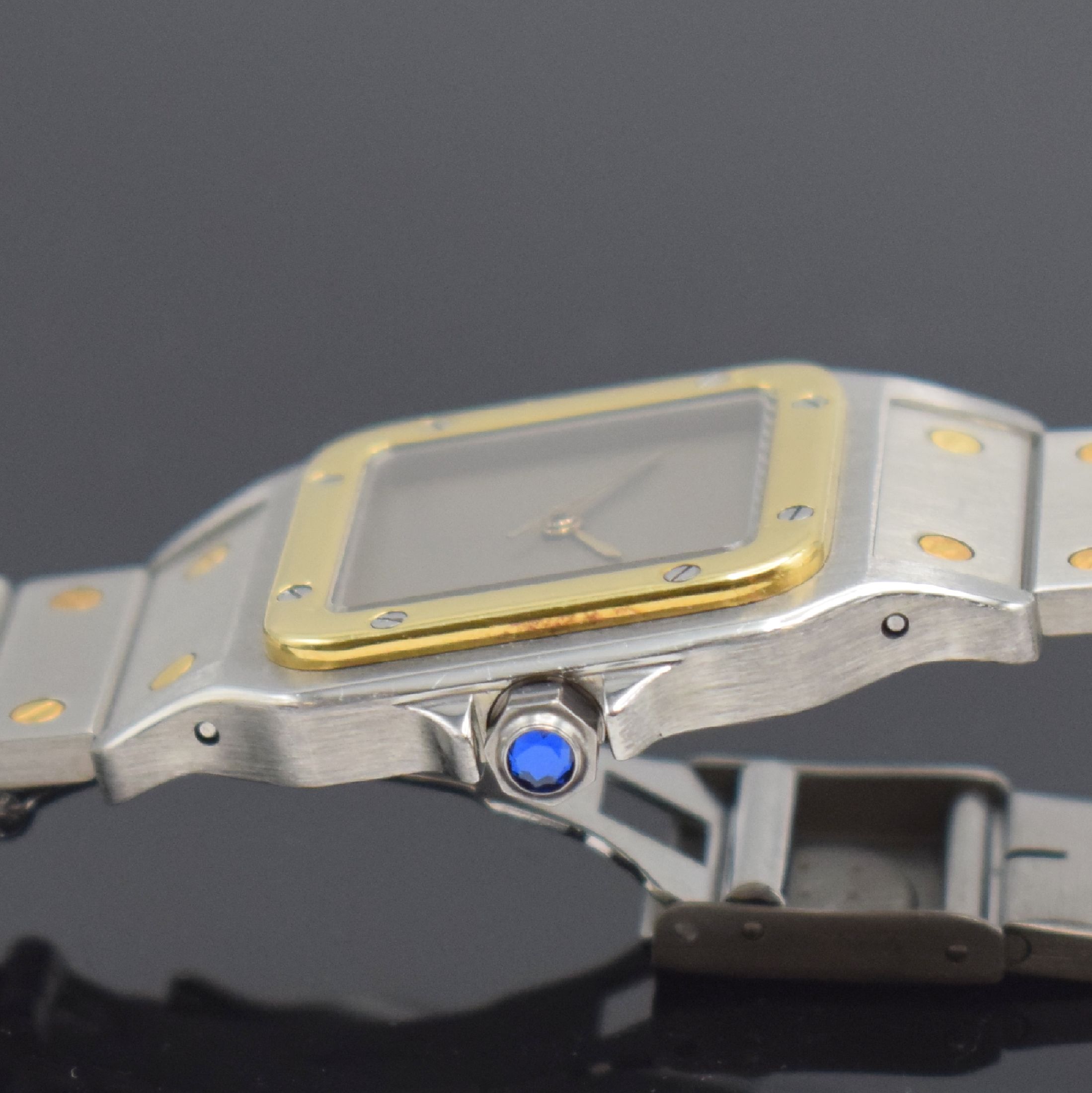 Detail e: CARTIER Santos Herrenarmbanduhr, Schweiz um 1985, Automatik, Edelstahl/Gold kombiniert inkl. Gliederband m. Faltschl., Monocoque- Geh., Lünette ...