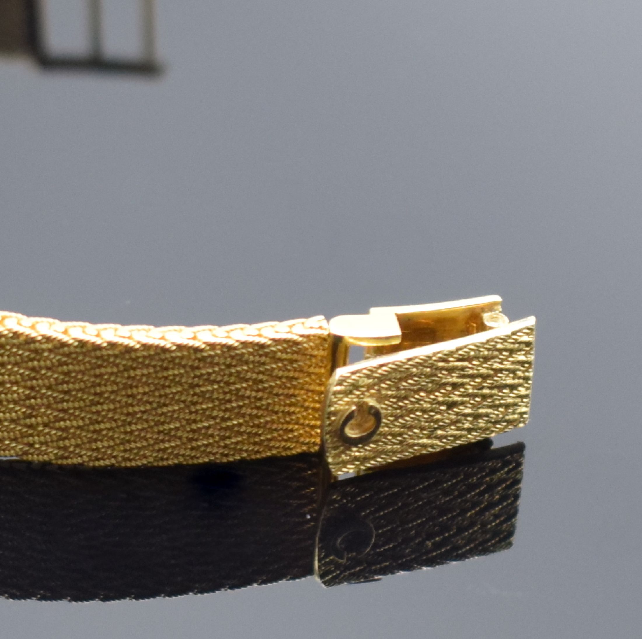 Detail b: CHOPARD Damenarmbanduhr in GG 750/000 Referenz 5147, Schweiz um 1990, quarz, GG 750/000 Band, Boden aufgedr., goldfarb. Zifferbl. m. gold. Std.-Ind. ...
