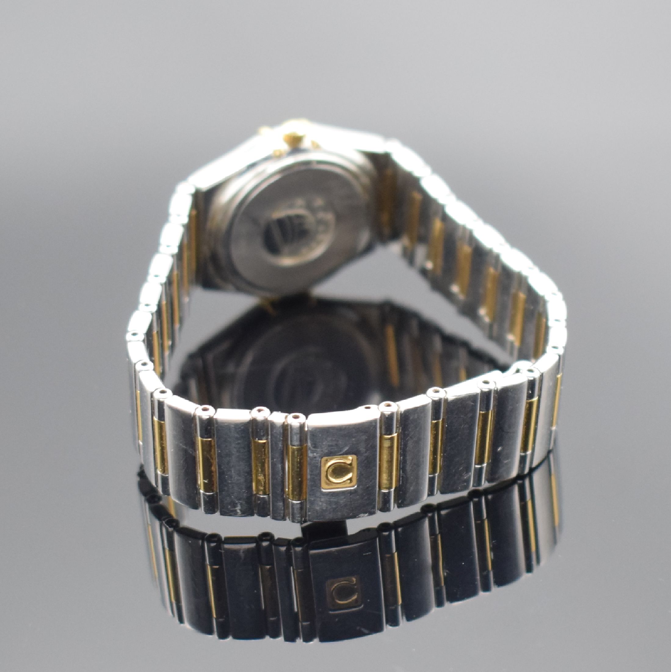 Detail b: OMEGA Constellation Damenarmbanduhr in Stahl/Gold, Schweiz um 2000, quarz, Boden aufgedr., Gliederband m. Faltschl., Lünette m. röm. Zahlen, ...