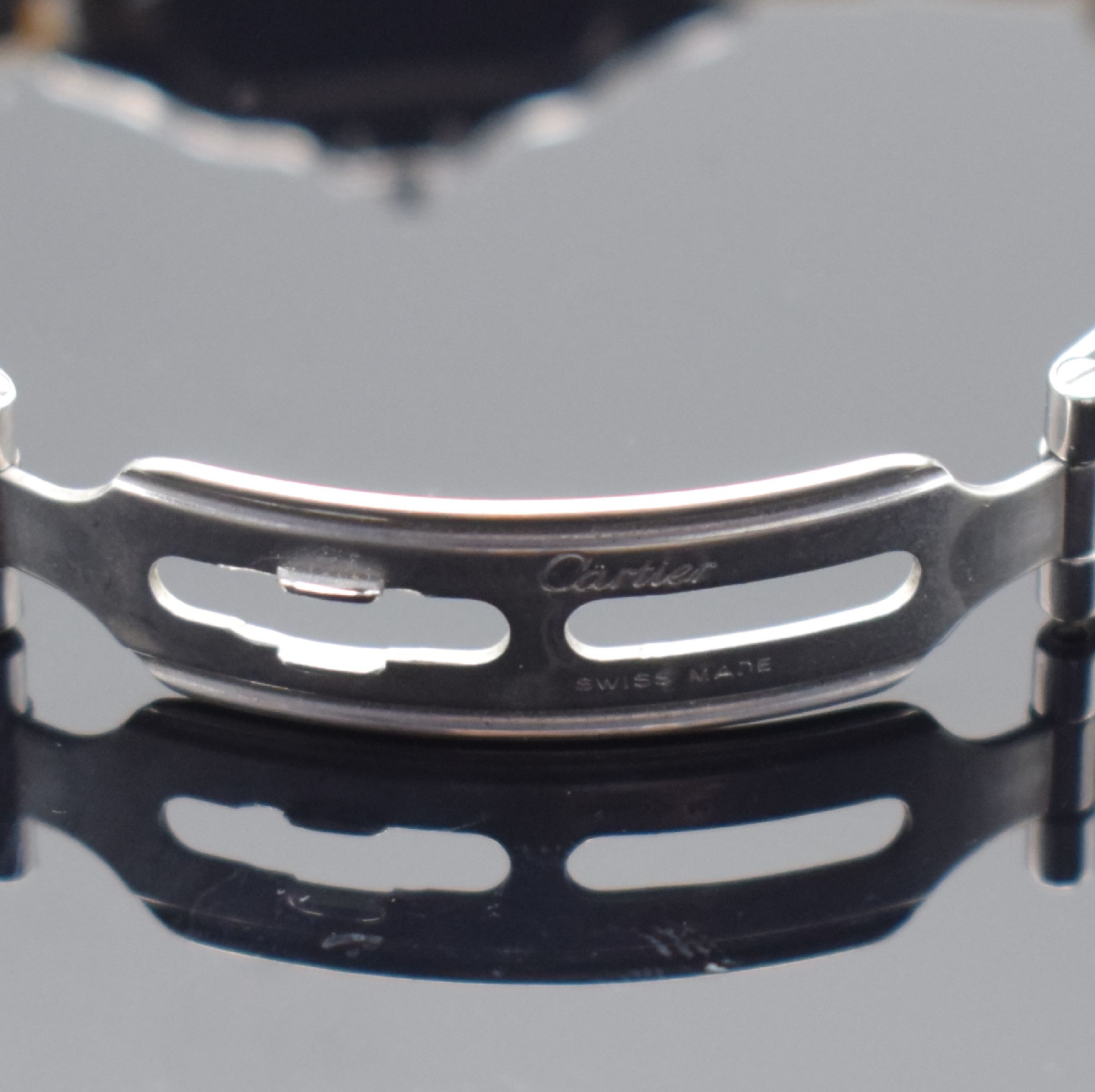 Detail b: CARTIER Panthere Damenarmbanduhr in Stahl/Gold, Schweiz um 1990, quarz, Boden 8-fach verschr., orig. Gliederband m. dopp. Faltschl., Zifferbl. m. ...