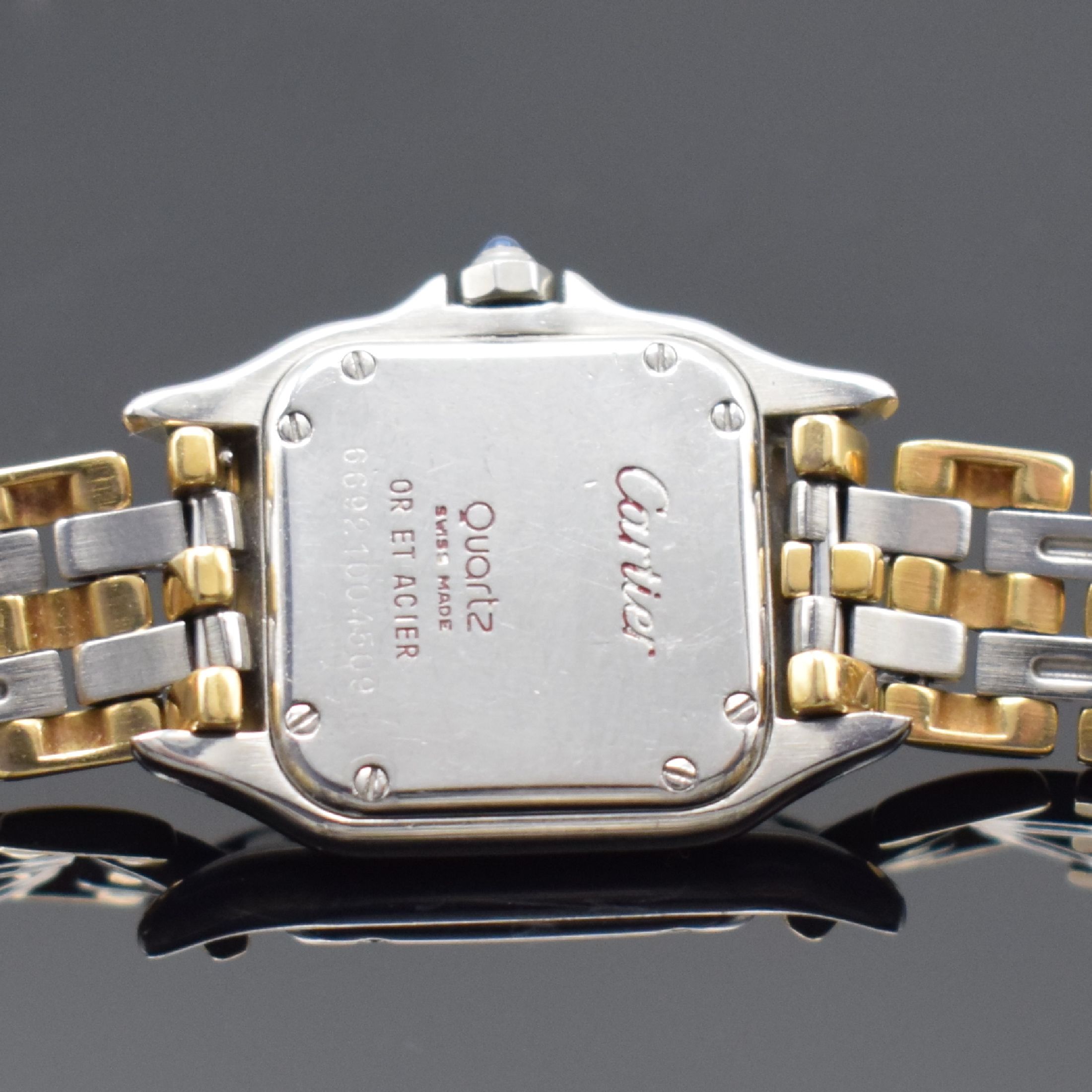 Detail c: CARTIER Panthere Damenarmbanduhr in Stahl/Gold, Schweiz um 1990, quarz, Boden 8-fach verschr., orig. Gliederband m. dopp. Faltschl., Zifferbl. m. ...