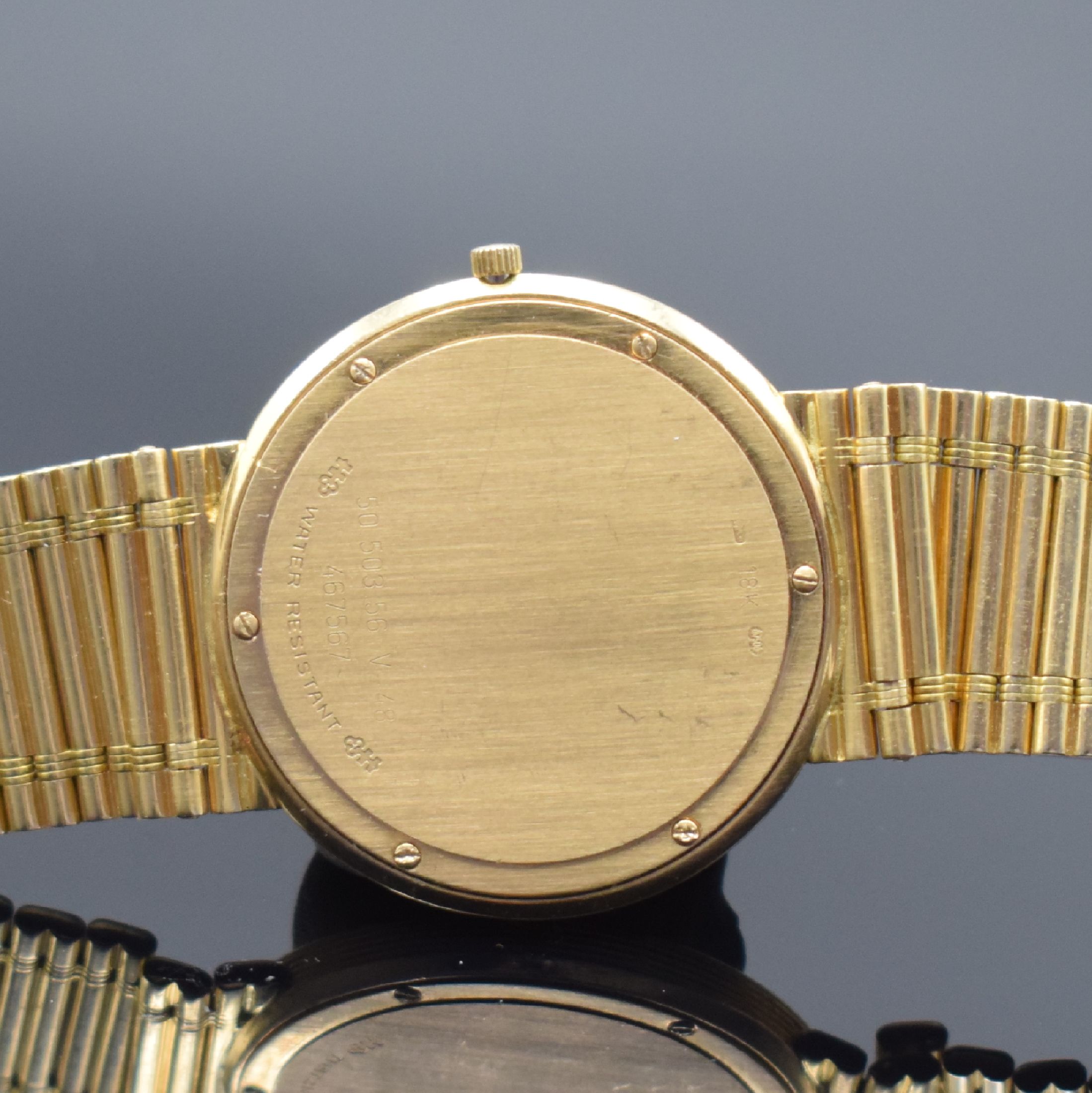 Detail d: CORUM Herrengoldbanduhr Serie Romulus in GG 750/000 Referenz 50.503.56 V-48, Schweiz um 1988, GG 750/000 Gliederband, Boden 6-fach verschr., ...