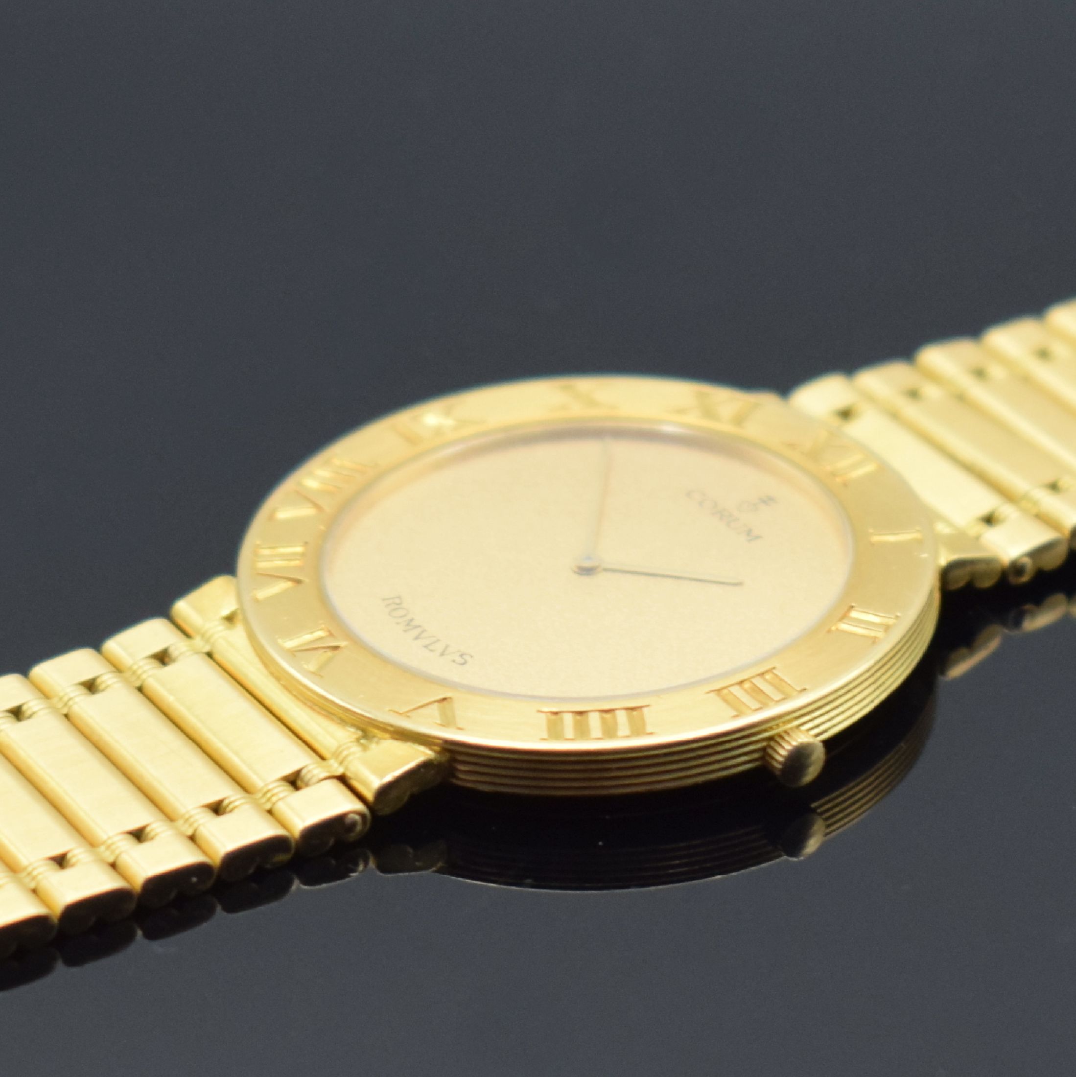Detail e: CORUM Herrengoldbanduhr Serie Romulus in GG 750/000 Referenz 50.503.56 V-48, Schweiz um 1988, GG 750/000 Gliederband, Boden 6-fach verschr., ...