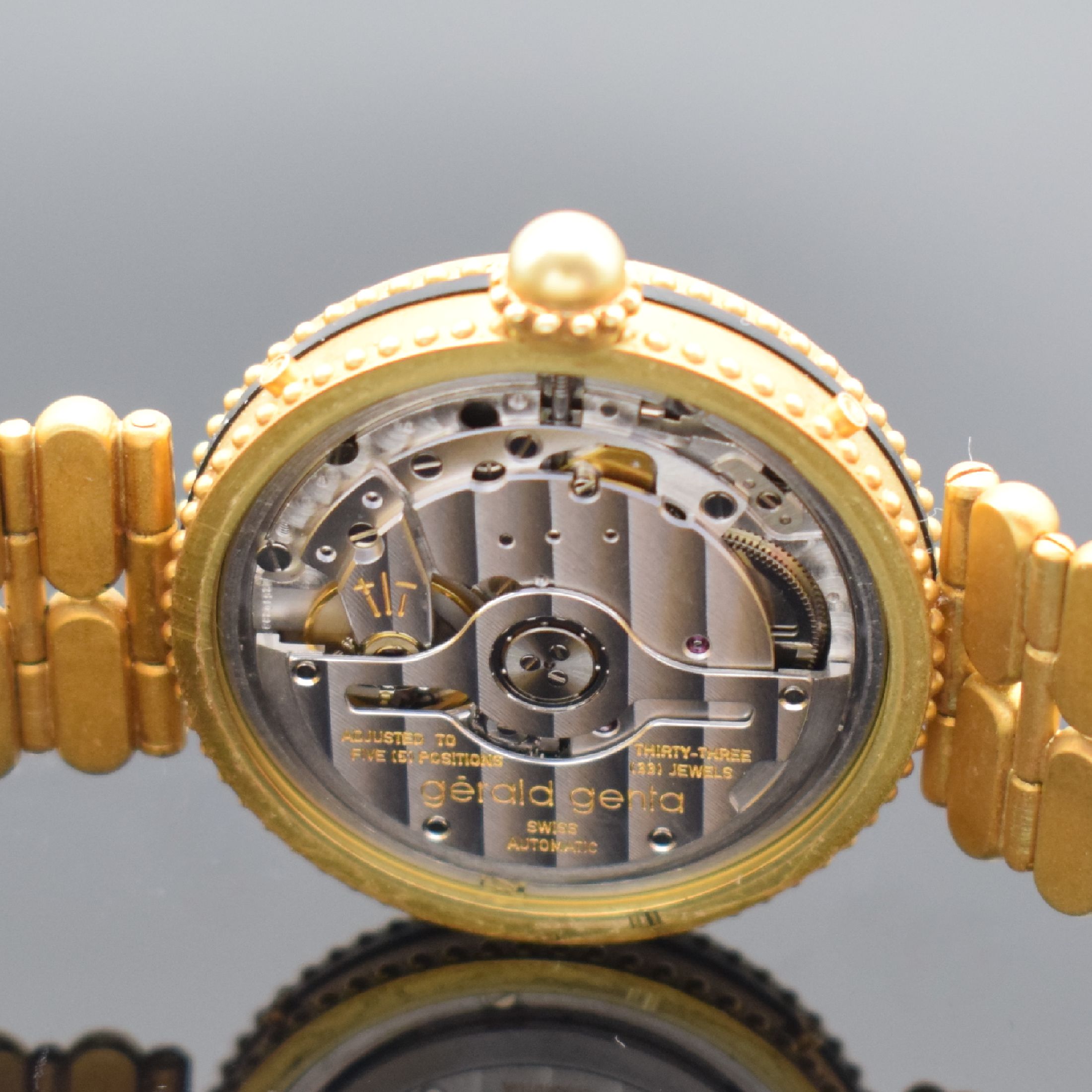 Detail g: GÉRALD GENTA feine und seltene, astronomische Armbanduhr Serie Gefica in GG 750/000 Referenz G.3149.7, Automatik, Schweiz 1980er Jahre, orig. GG ...