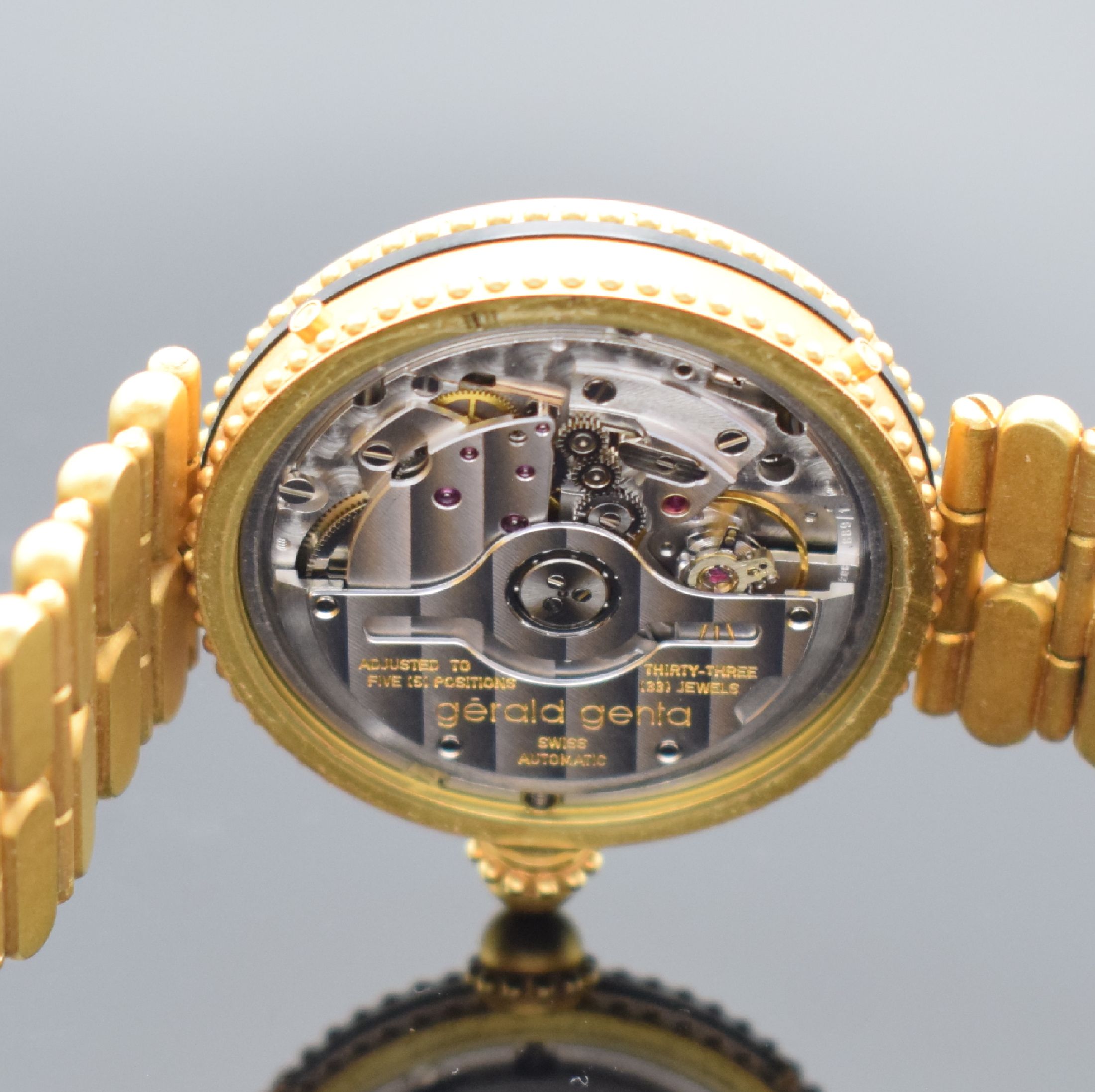 Detail h: GÉRALD GENTA feine und seltene, astronomische Armbanduhr Serie Gefica in GG 750/000 Referenz G.3149.7, Automatik, Schweiz 1980er Jahre, orig. GG ...