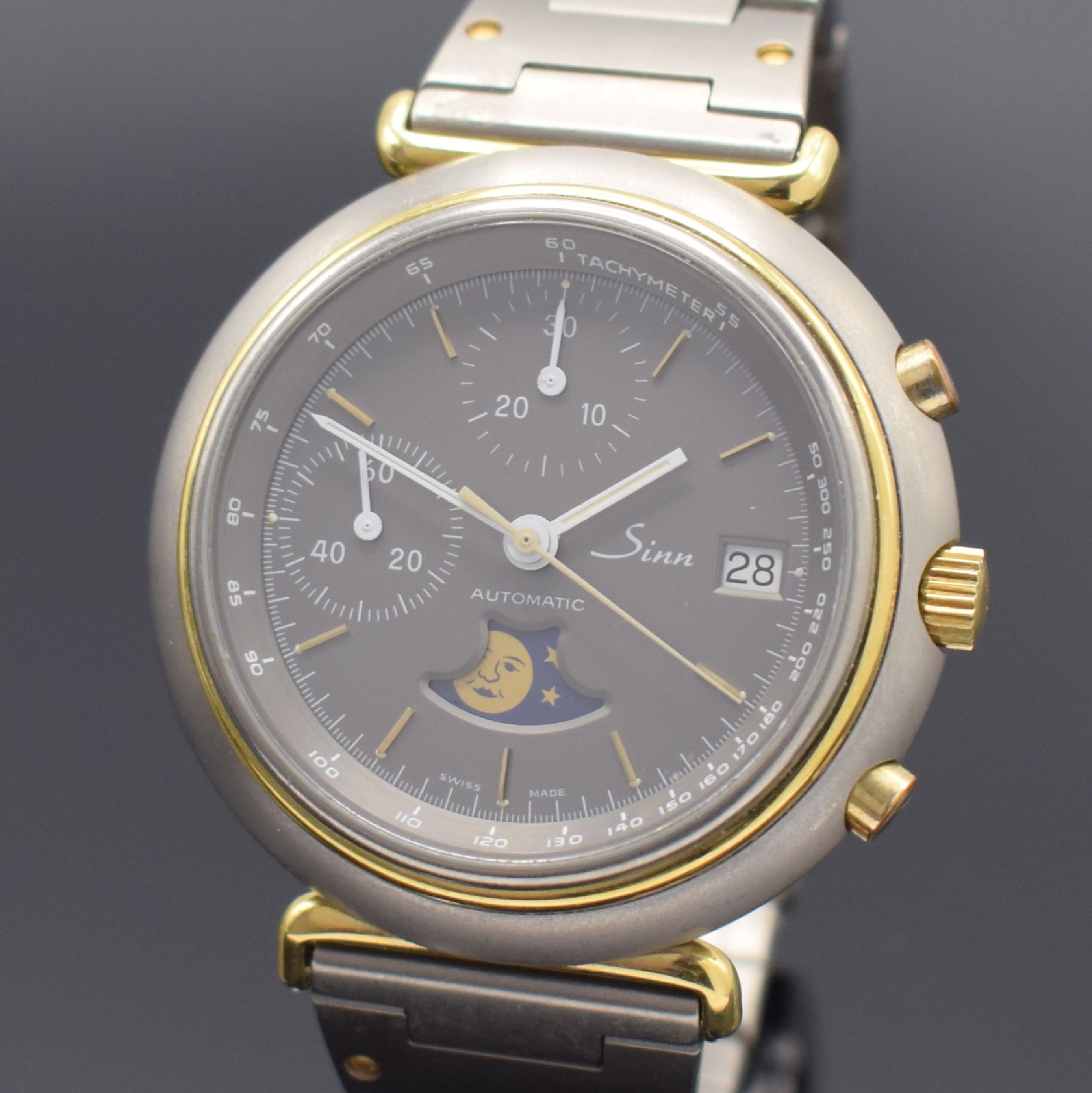 Detail a: SINN Armbandchronograph mit Mondphase Referenz 247, Automatik, Deutschland um 1980, Titangeh. inkl. Gliederband z. T. verg., Boden aufgedr., Anz. v. ...
