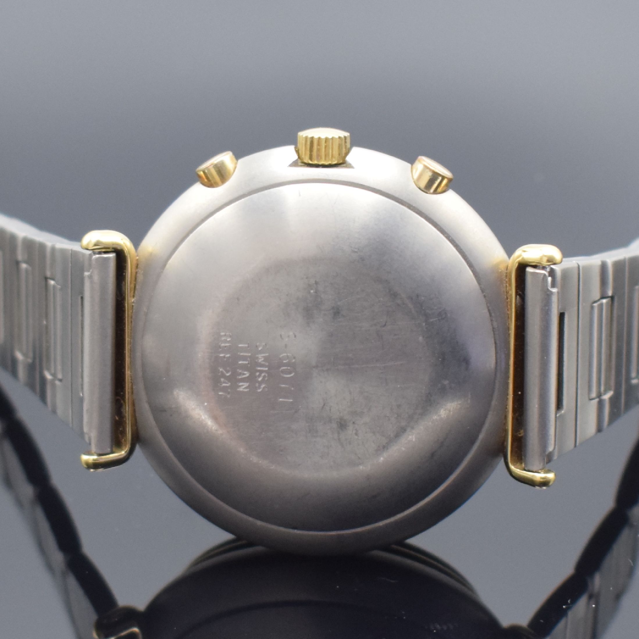 Detail c: SINN Armbandchronograph mit Mondphase Referenz 247, Automatik, Deutschland um 1980, Titangeh. inkl. Gliederband z. T. verg., Boden aufgedr., Anz. v. ...