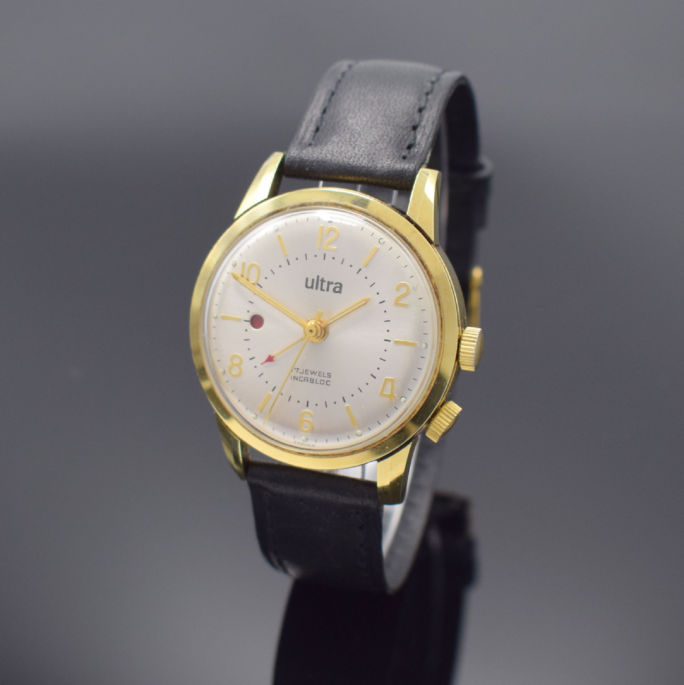 ULTRA Armbandwecker, Handaufzug, Schweiz um 1960, verg. Metallgeh., Edelstahlboden verschr., Weckbereitschaftsfenster bei 9, Kal. Venus 230, ...