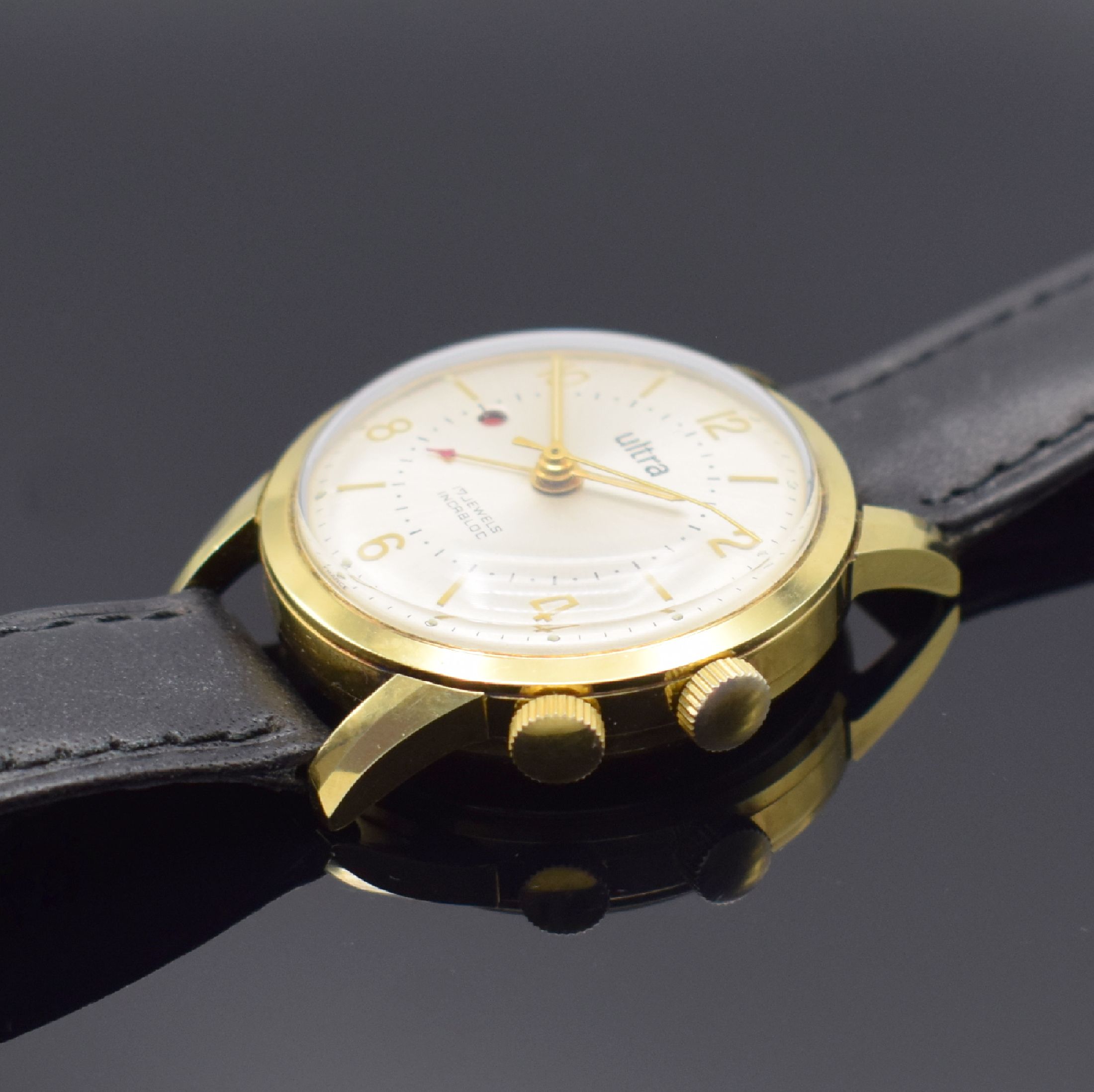 Detail b: ULTRA Armbandwecker, Handaufzug, Schweiz um 1960, verg. Metallgeh., Edelstahlboden verschr., Weckbereitschaftsfenster bei 9, Kal. Venus 230, ...
