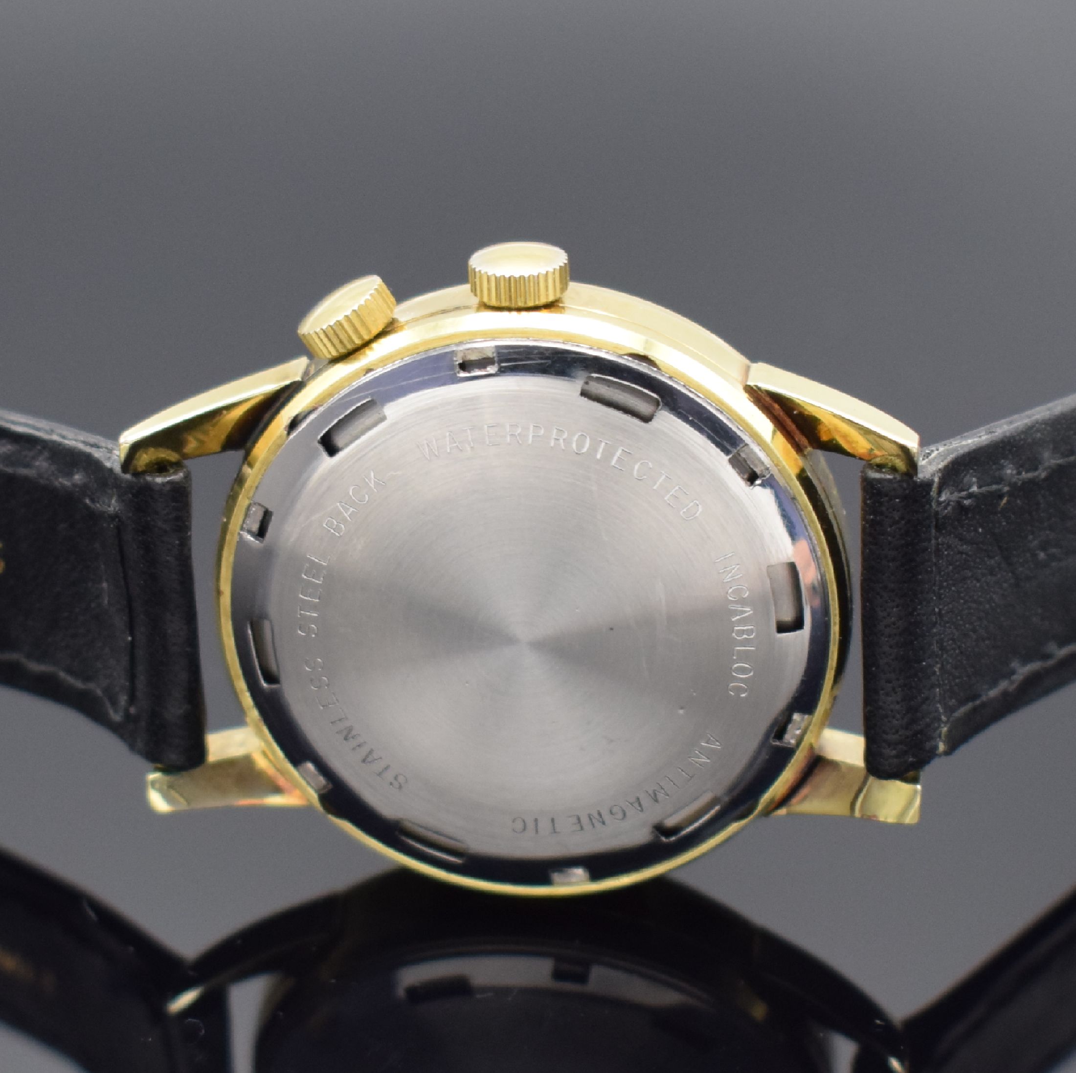 Detail c: ULTRA Armbandwecker, Handaufzug, Schweiz um 1960, verg. Metallgeh., Edelstahlboden verschr., Weckbereitschaftsfenster bei 9, Kal. Venus 230, ...